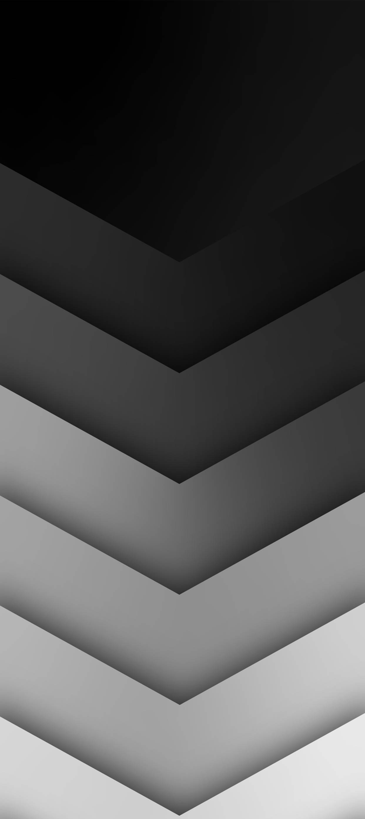Chevron圖案黑灰iPhone壁紙 壁紙 — 極簡風格單色牆紙，採用分層人字形圖案，呈現漸變灰階色調。