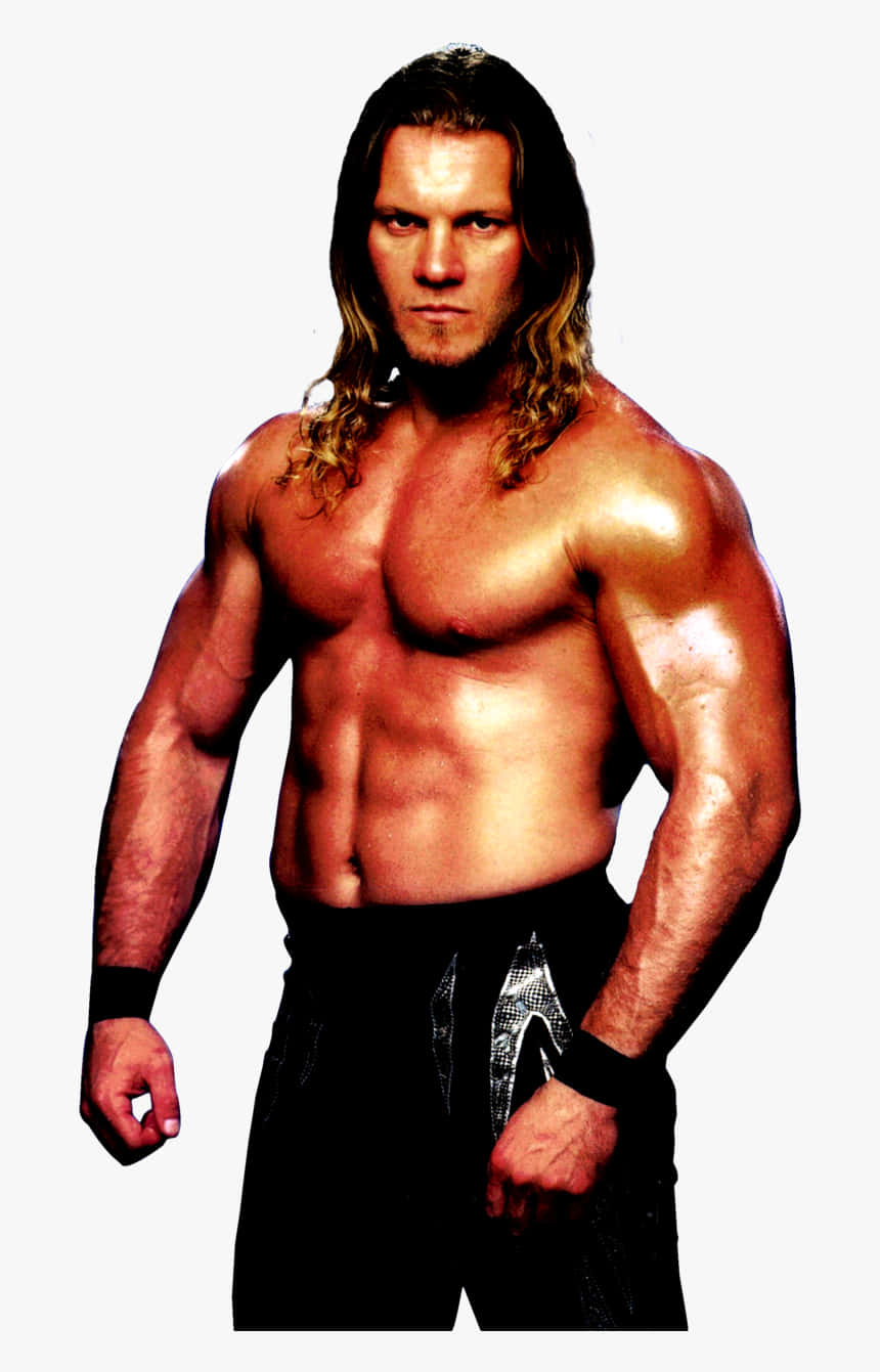 Chris Jericho WWE 2013 慣性時代 壁紙 — 一位肌肉發達、留著金色長髮的摔角手，穿著黑色緊身褲和護腕，在純色背景前凝視著。