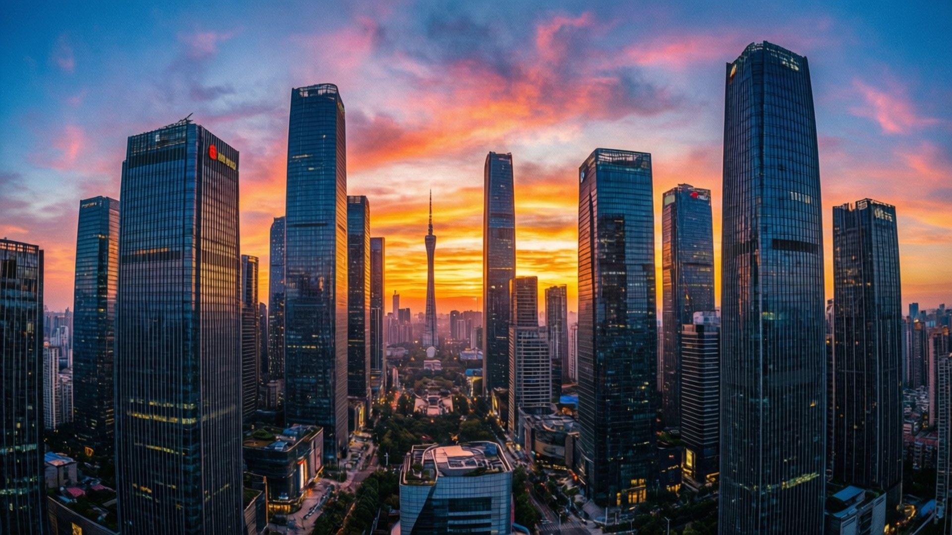 高聳的玻璃摩天大樓在現代城市景觀中反射出帶有橙色、粉紅色和藍色色調的充滿活力的日落。