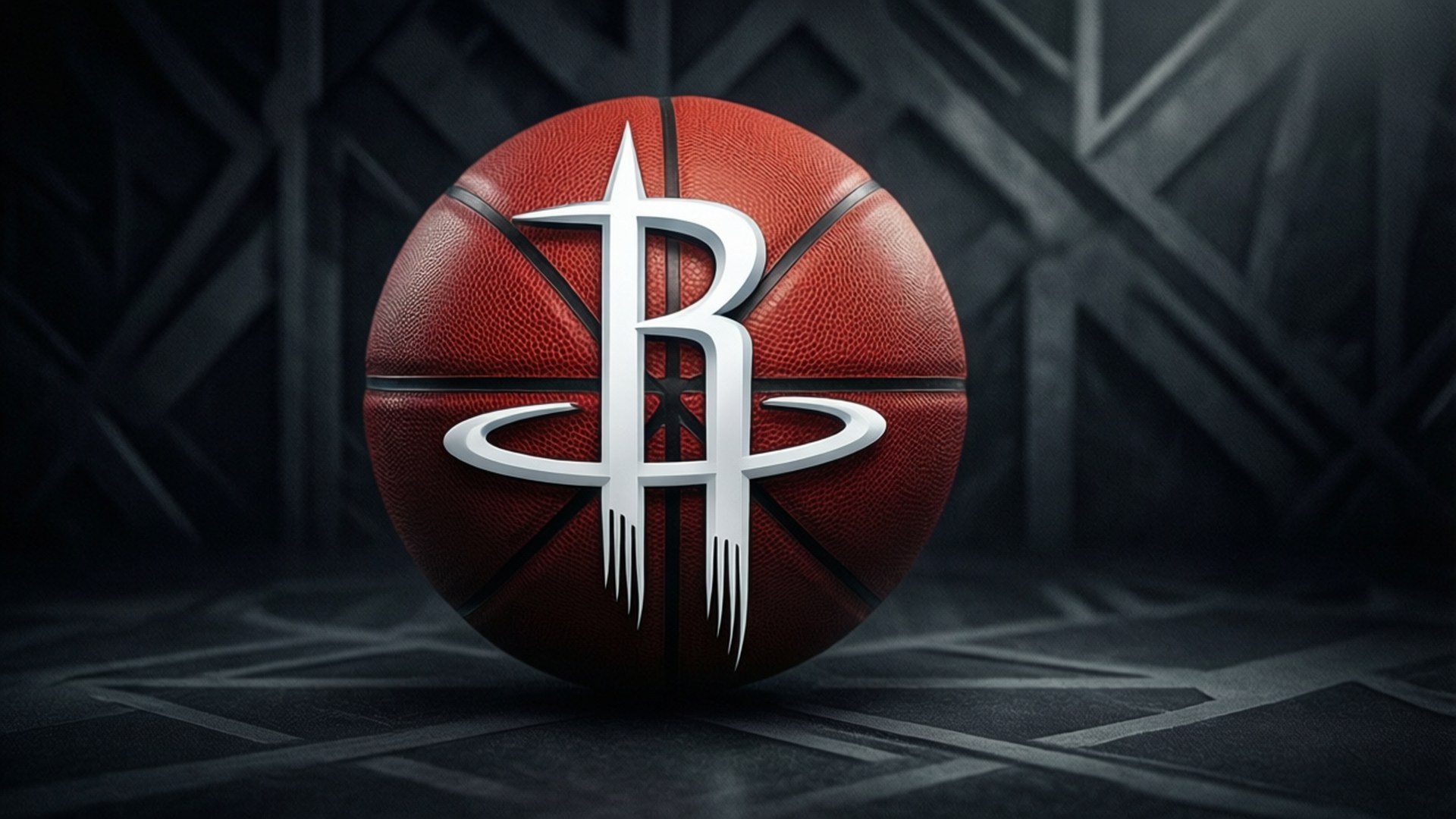 Classic Rocket Logo 壁紙 — 一個紅色籃球，帶有銀色侯斯頓火箭隊標誌，置於深色幾何圖案地板中央。