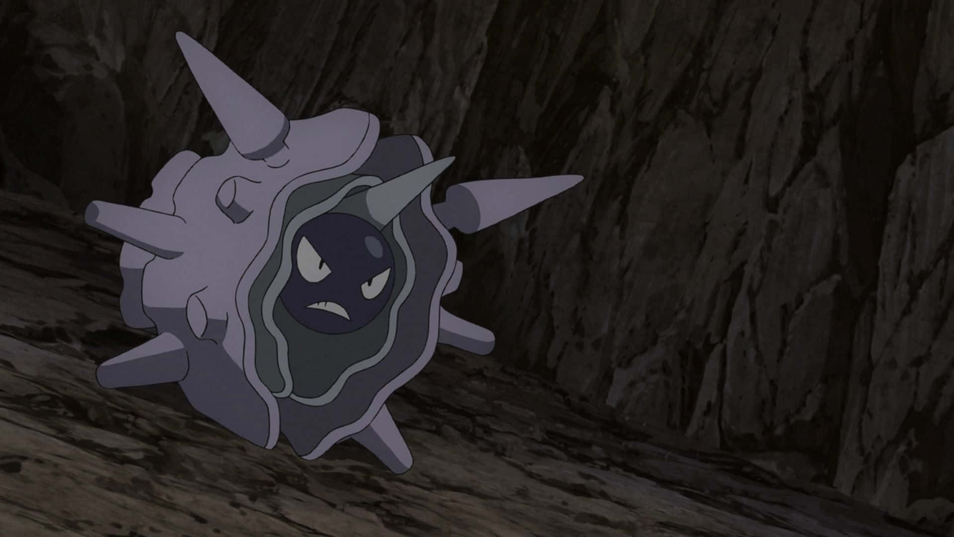 Cloyster 洞穴 壁紙 — 一隻帶有尖刺和發光眼睛的灰色寶可夢，在黑暗的岩石洞穴中蹲伏，顯得威嚇。