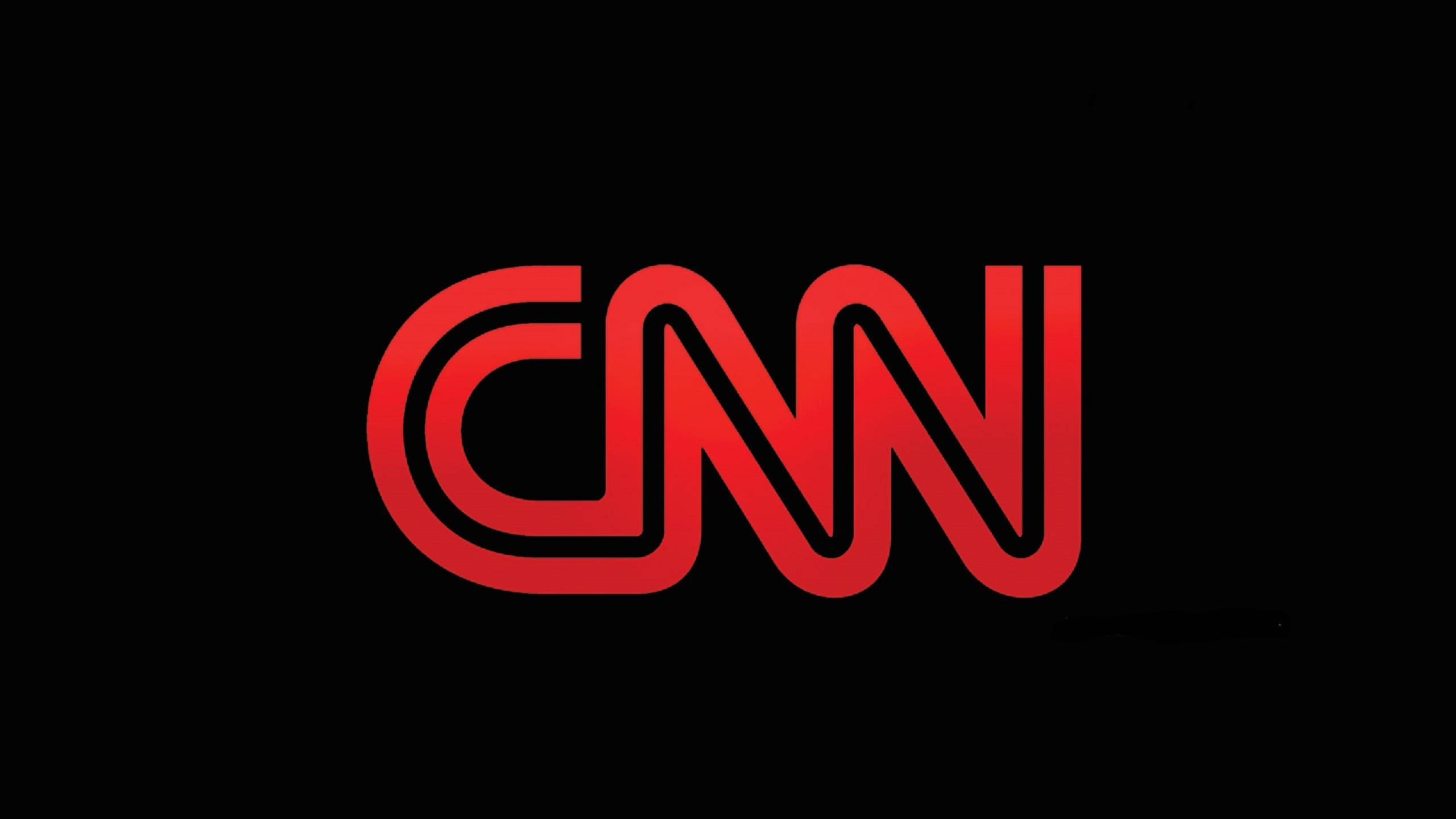 CNN 媒體電視頻道 壁紙 — 大膽的紅色CNN標誌居中於純黑色背景上，設計現代簡潔。