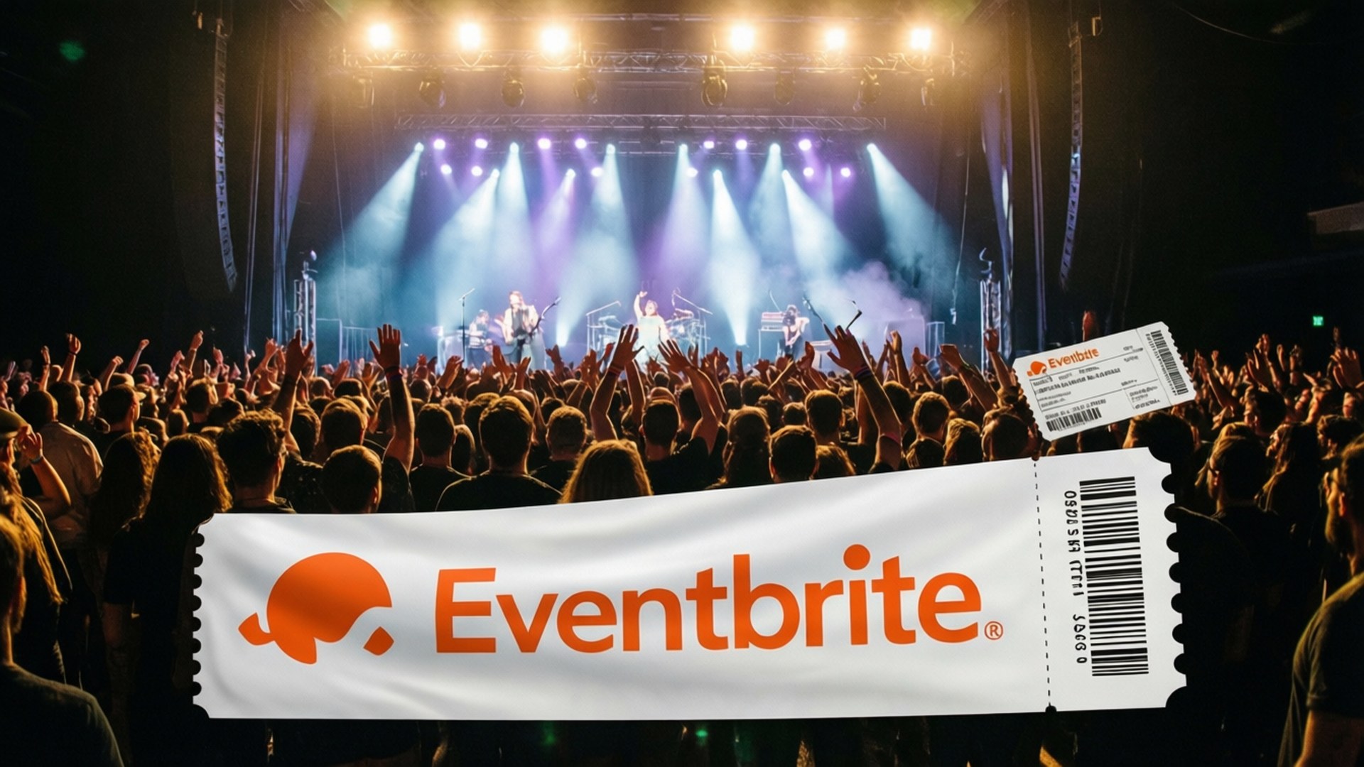 在舞台燈光下，歡呼的演唱會人群前舉著的Eventbrite門票橫幅