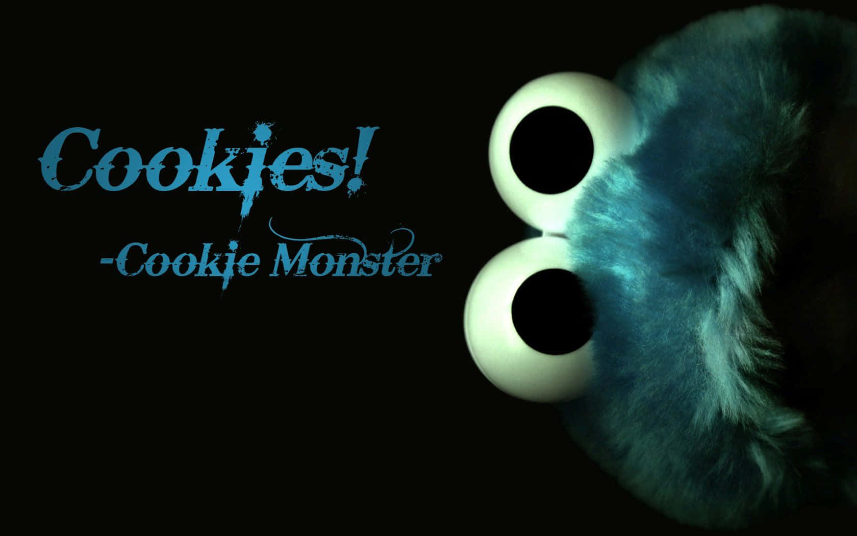 Cookie Monster 桌布 壁紙 — Cookie Monster 發光的眼睛和毛茸茸的藍色臉部特寫，背景為黑色，藍色文字寫著「Cookies!」