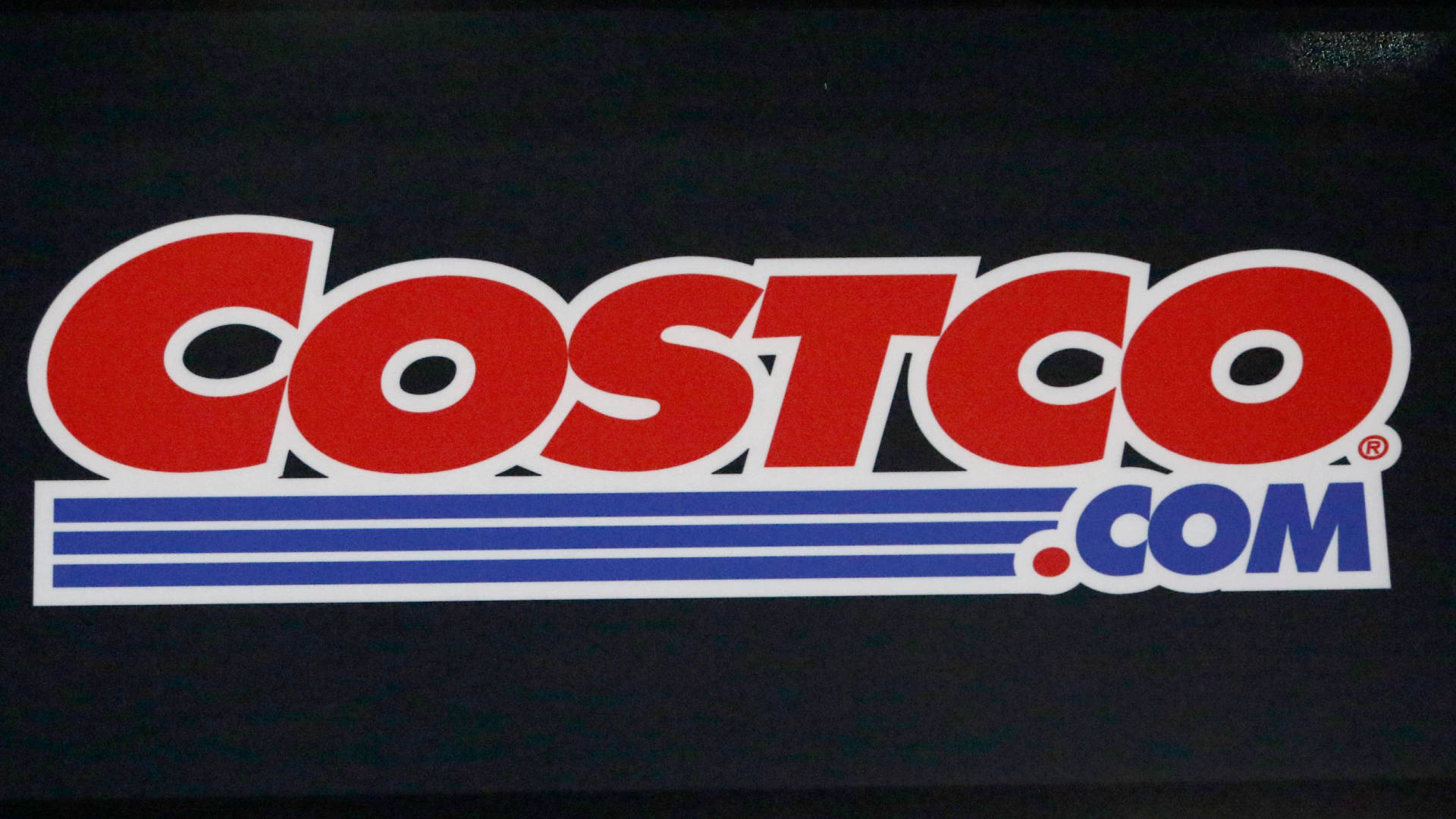 Costco.com 標誌貼紙，顏色為紅、藍、白。