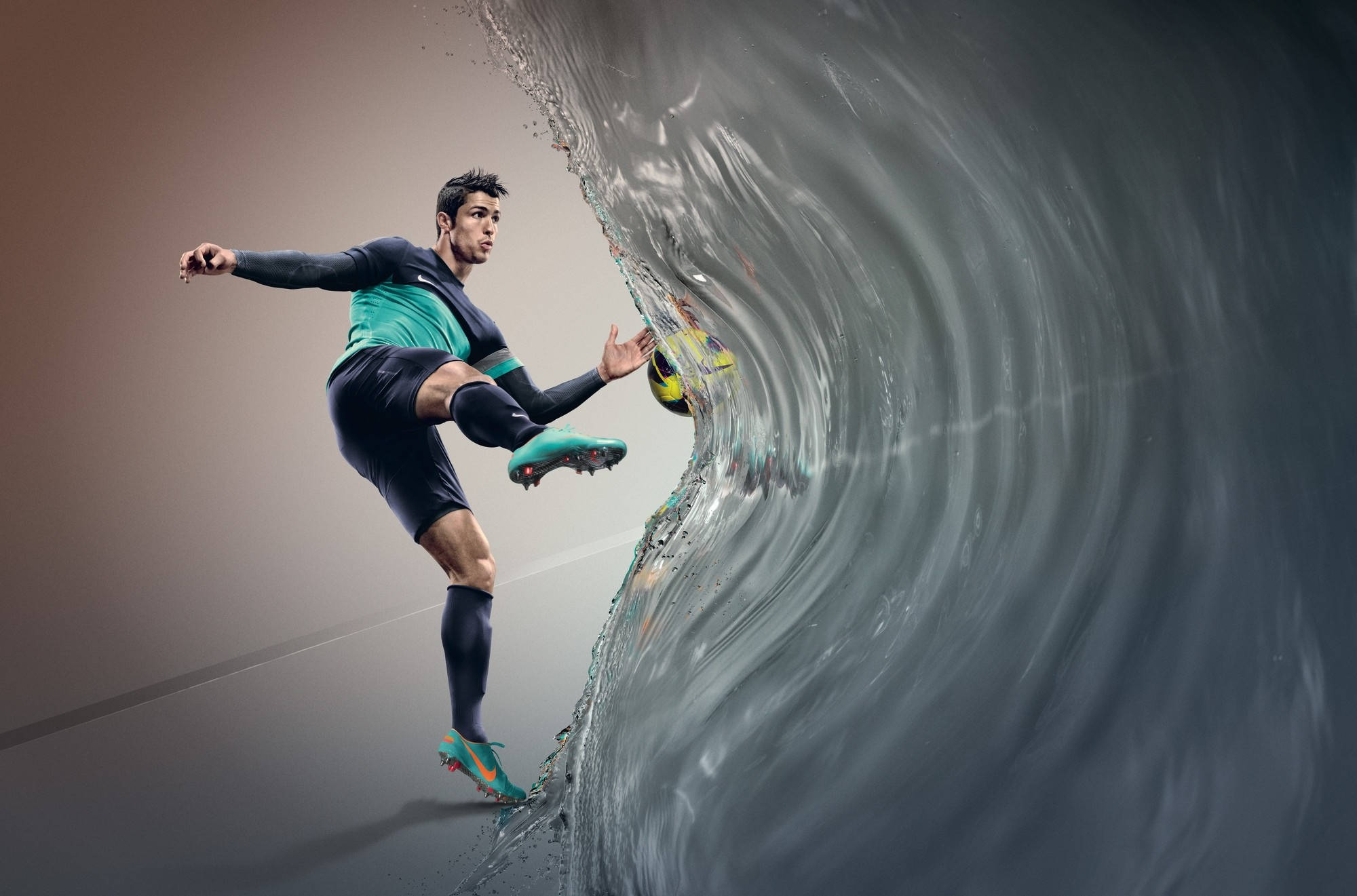 CR7 水波射門 壁紙 — 一名足球運動員在運動中踢球穿過旋轉的水波，背景為漸變色。