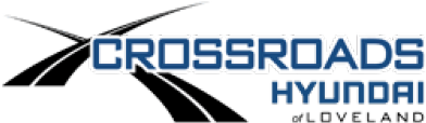 Crossroads現代汽車經銷商標誌 壁紙 — 大膽的藍白「CROSSROADS HYUNDAI」標誌，帶有相交的銀色線條，背景為黑色。