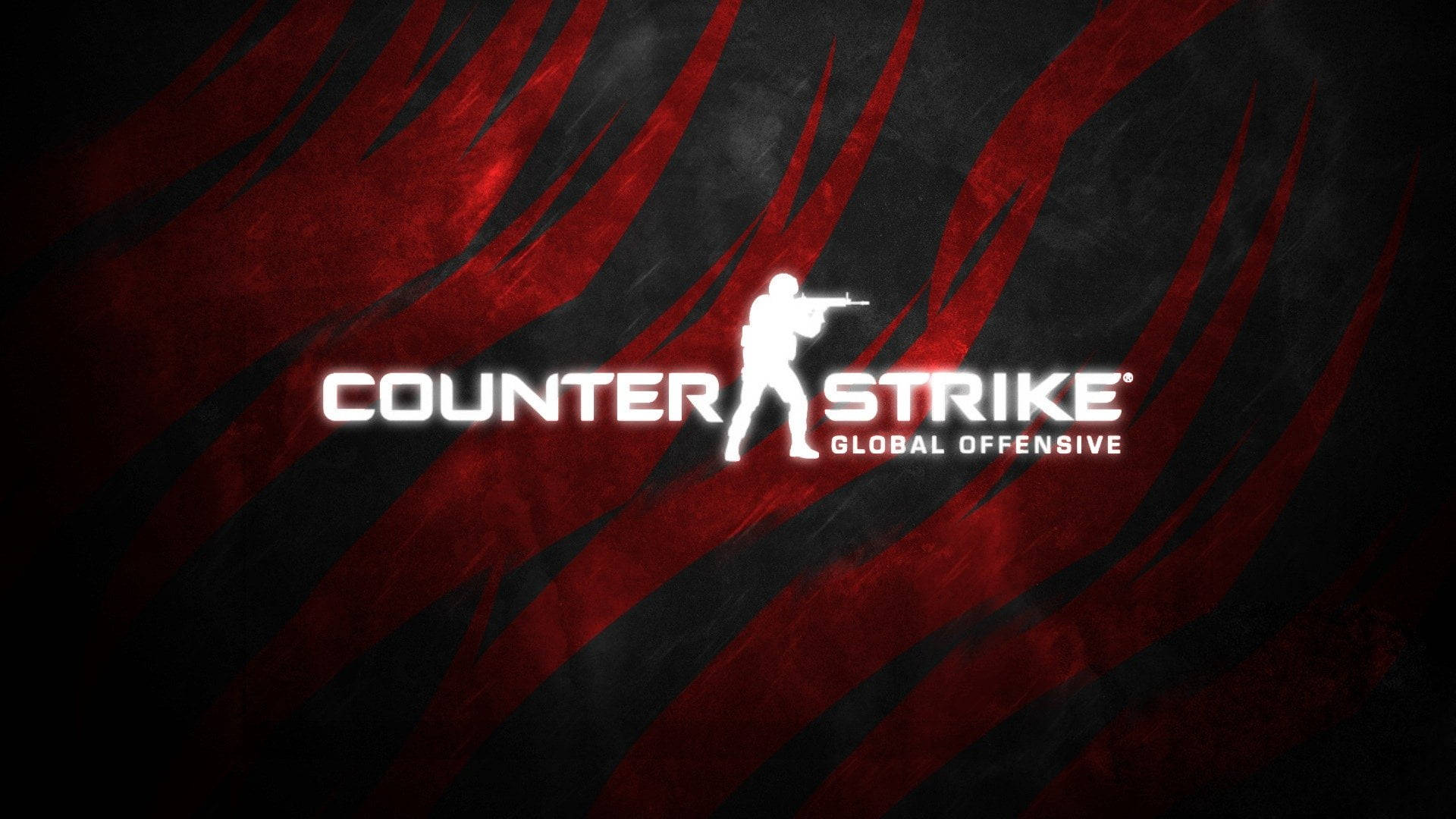 紅黑條紋背景上的Counter Strike Global Offensive標誌與士兵剪影