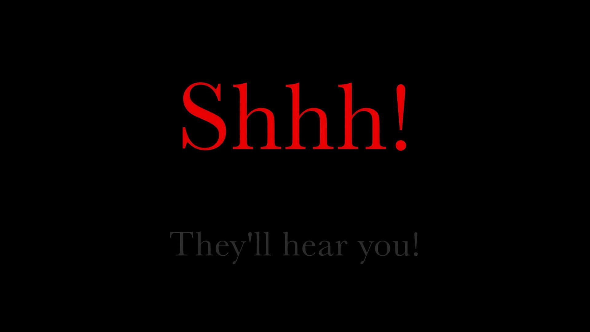  壁紙 — 粗體紅色文字「Shhh!」警告不要發出噪音，而較小的灰色文字「他們會聽到你！」在黑色背景上增添了懸念。