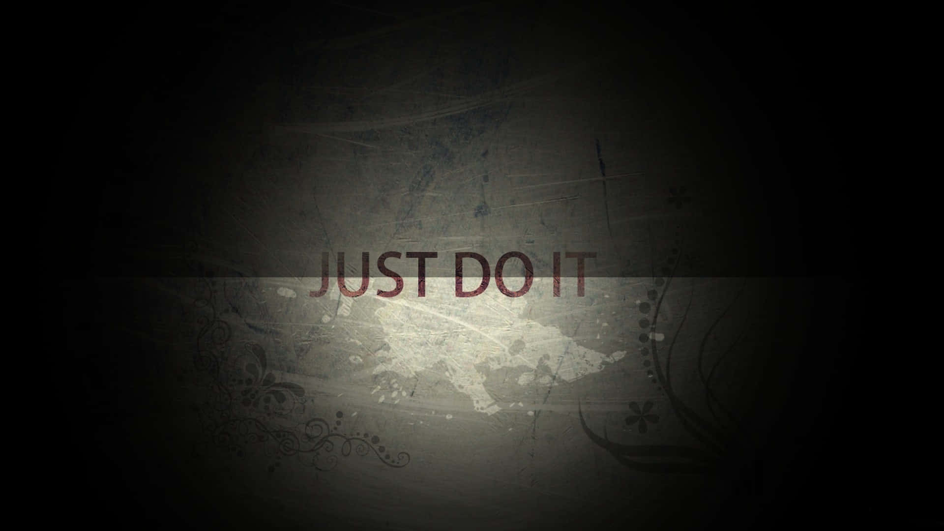  壁紙 — 深色紋理背景，帶有褪色花卉圖案和粗體紅色字句 just do it。