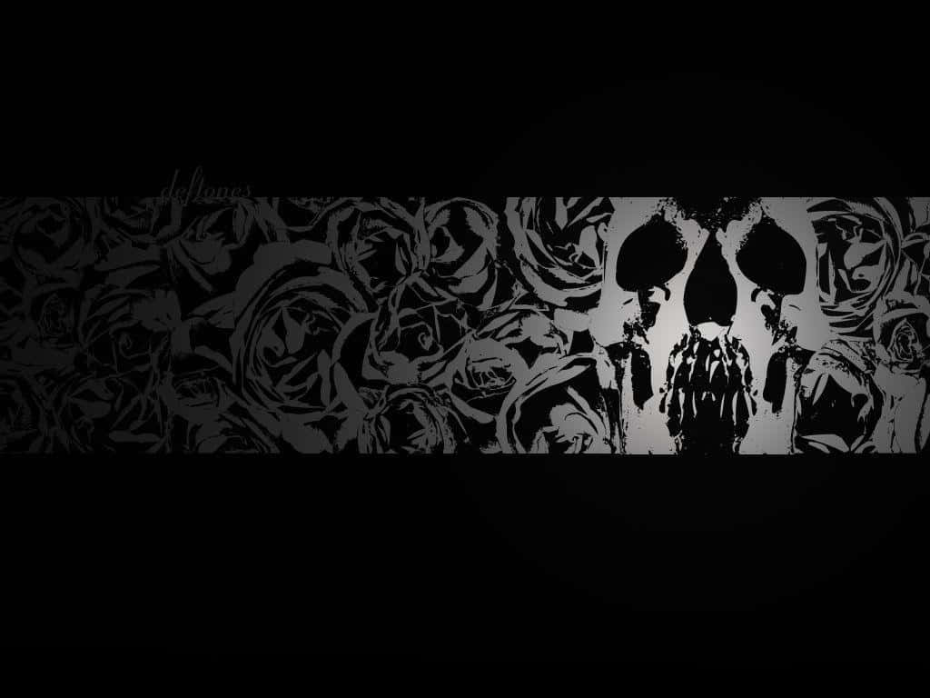 Deftones 骷髏高畫質專輯封面 壁紙 — 一幅鮮明的黑白牆紙，中央有一個被玫瑰包圍的骷髏剪影，背景為深色。