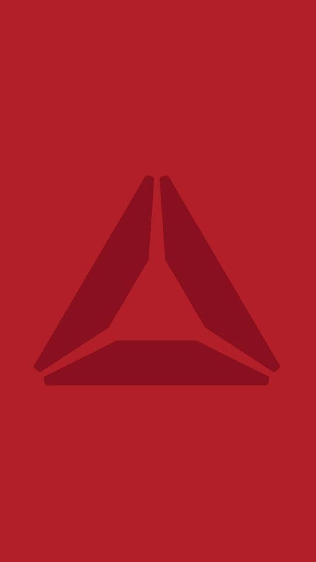 紅色Delta Reebok手機壁紙 壁紙 — 一個極簡的深紅色三角形標誌，居中於純紅色背景上。