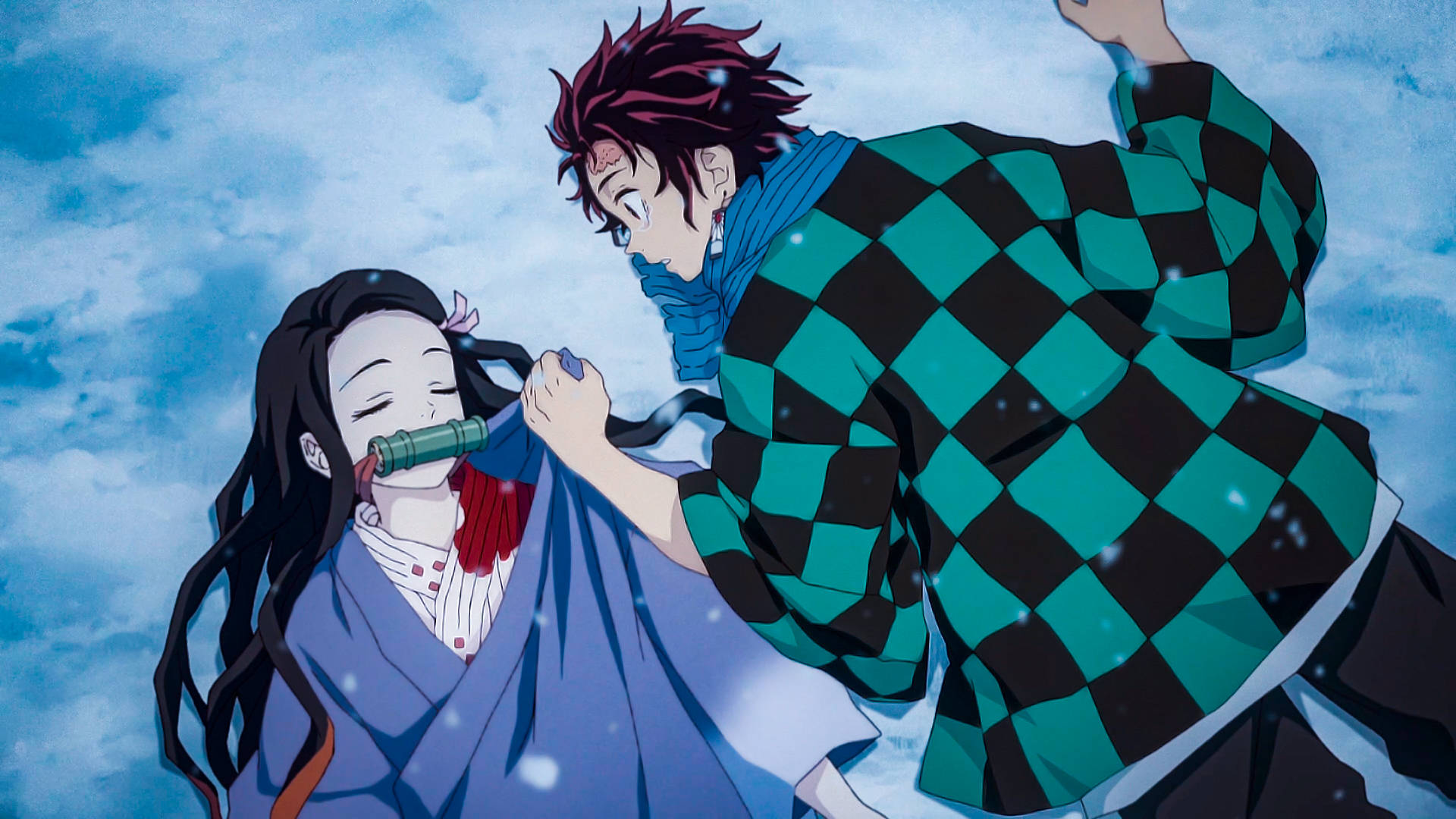 鬼滅之刃炭治郎在雪地上凝視祢豆子的壁紙