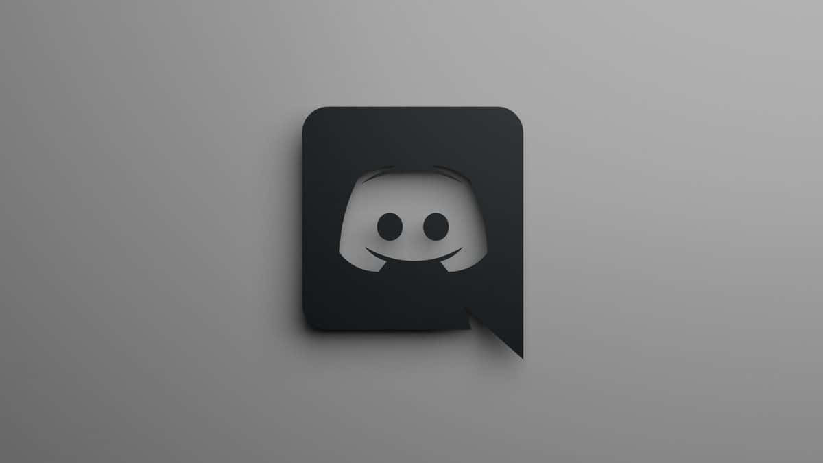 Discord 標誌圖標，灰色背景上帶有微笑鬼臉