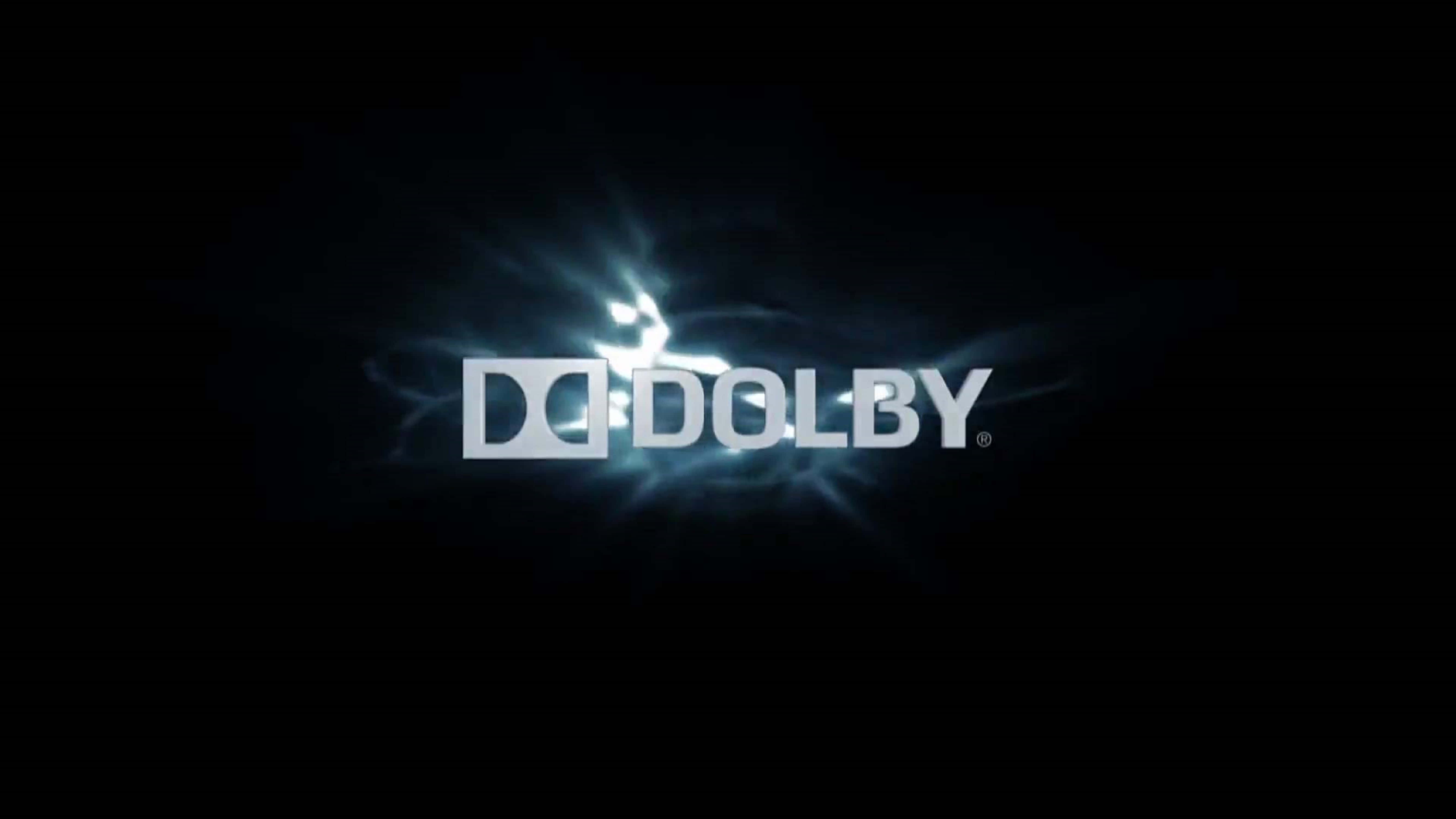4K Dolby Vision 桌布 壁紙 — Dolby 標誌在深色背景上發出電光藍光。