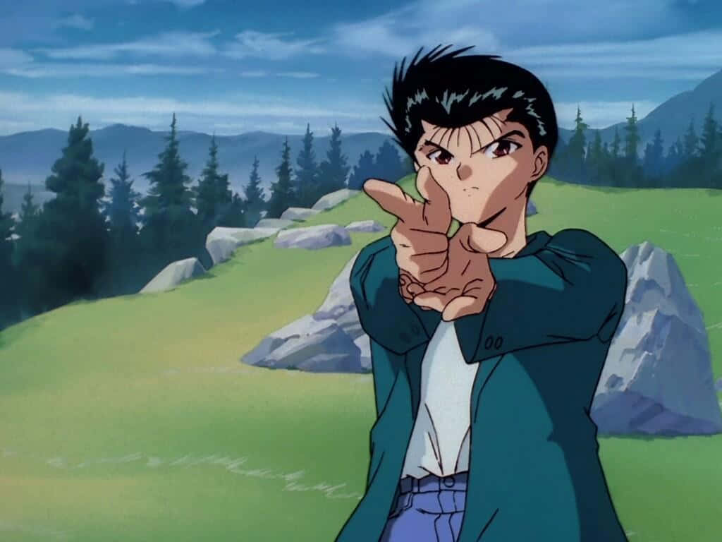 Keiko Yukimura 桌布 壁紙 — 一個決心堅定的動畫男孩，身穿綠色外套，雙手向前指，背景是起伏的丘陵、松樹和遠處的山脈，天空多雲。