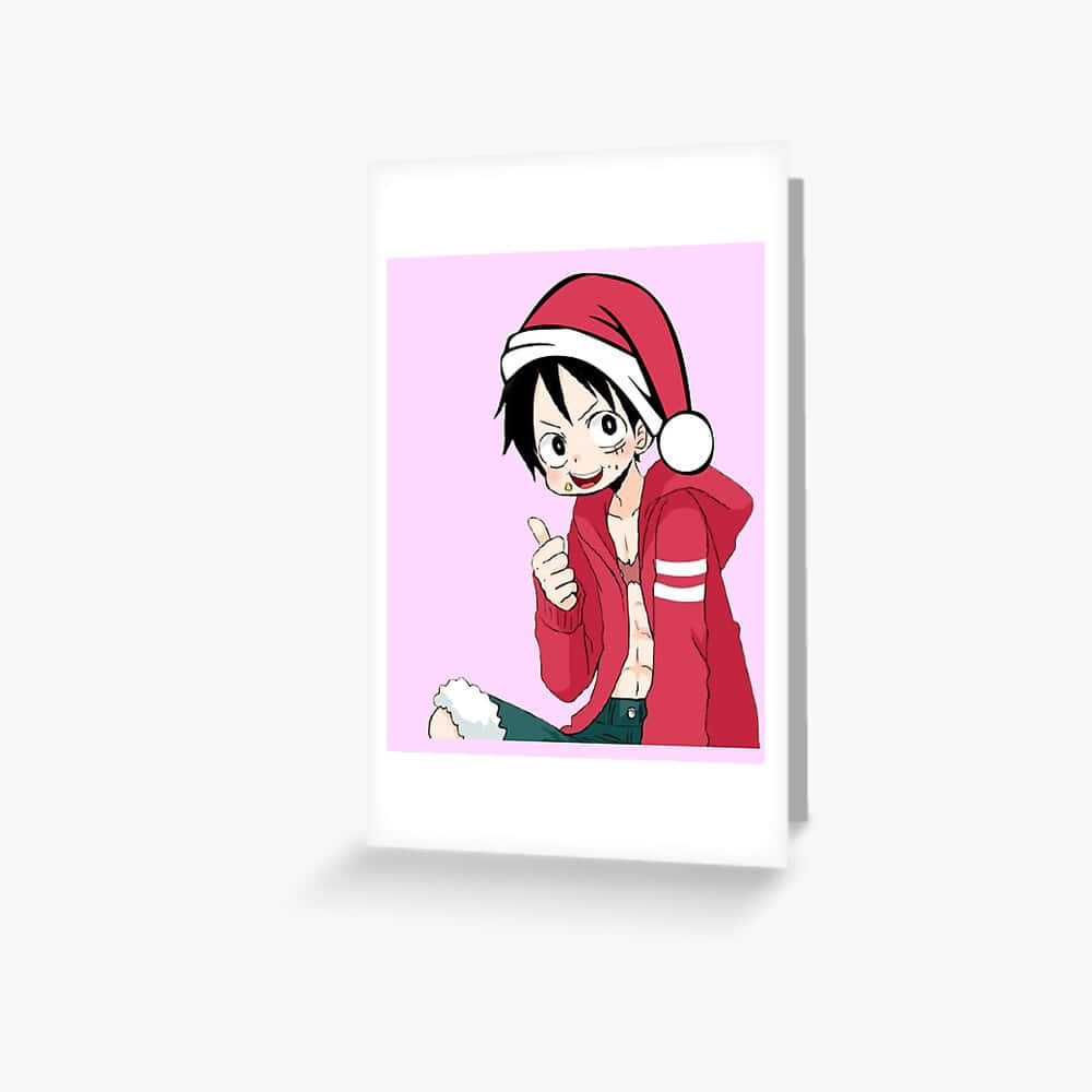 One Piece Christmas 桌布 壁紙 — 動漫角色路飛戴住紅色聖誕帽同連帽衫，喺粉紅色背景前豎起拇指。