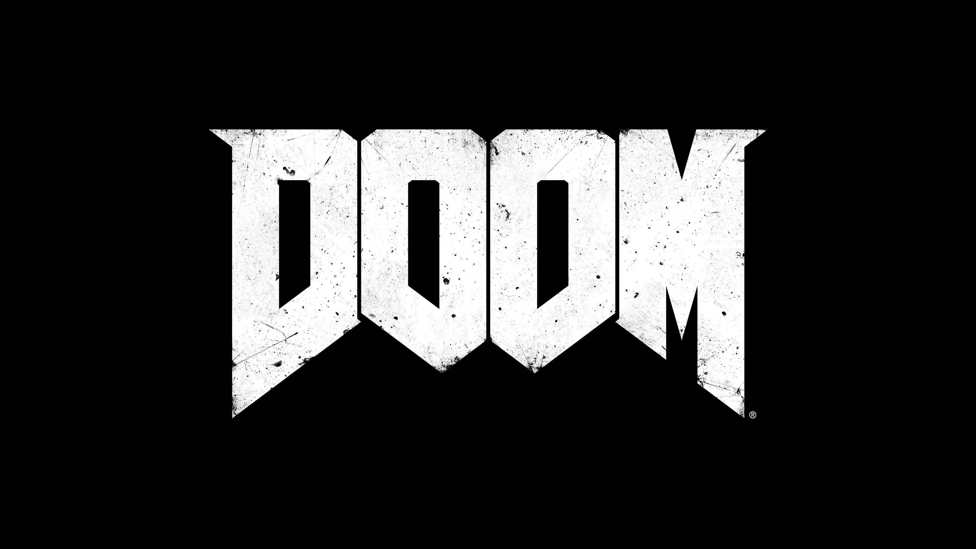 Doom HD 黑白字體 壁紙 — 粗體白色磨損字體的「DOOM」一字在純黑色背景上格外突出。