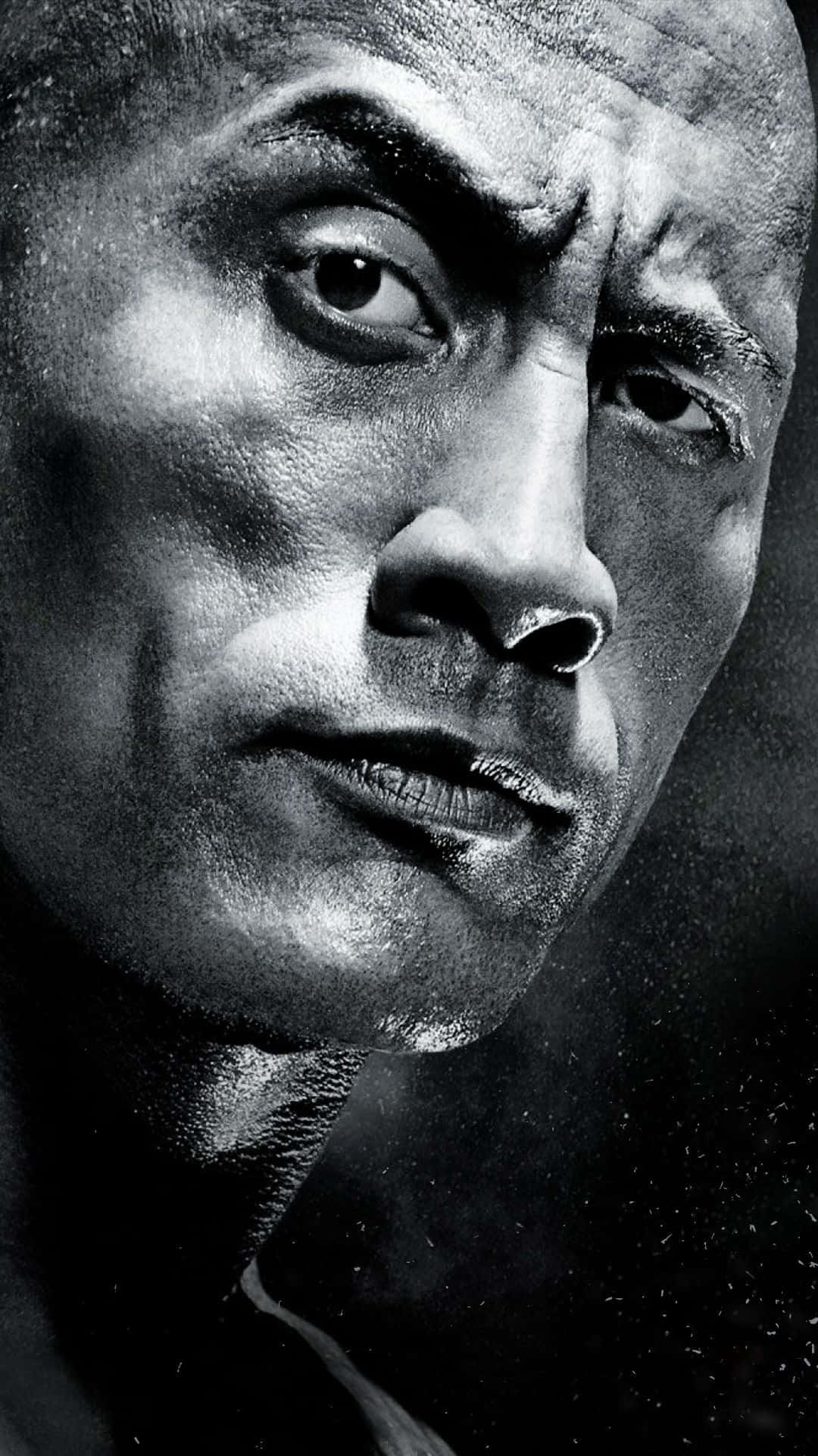 狄維·莊遜 桌布 壁紙 — Dwayne Johnson 嘅粗獷黑白特寫，表情強烈，燈光戲劇性，汗水清晰可見。