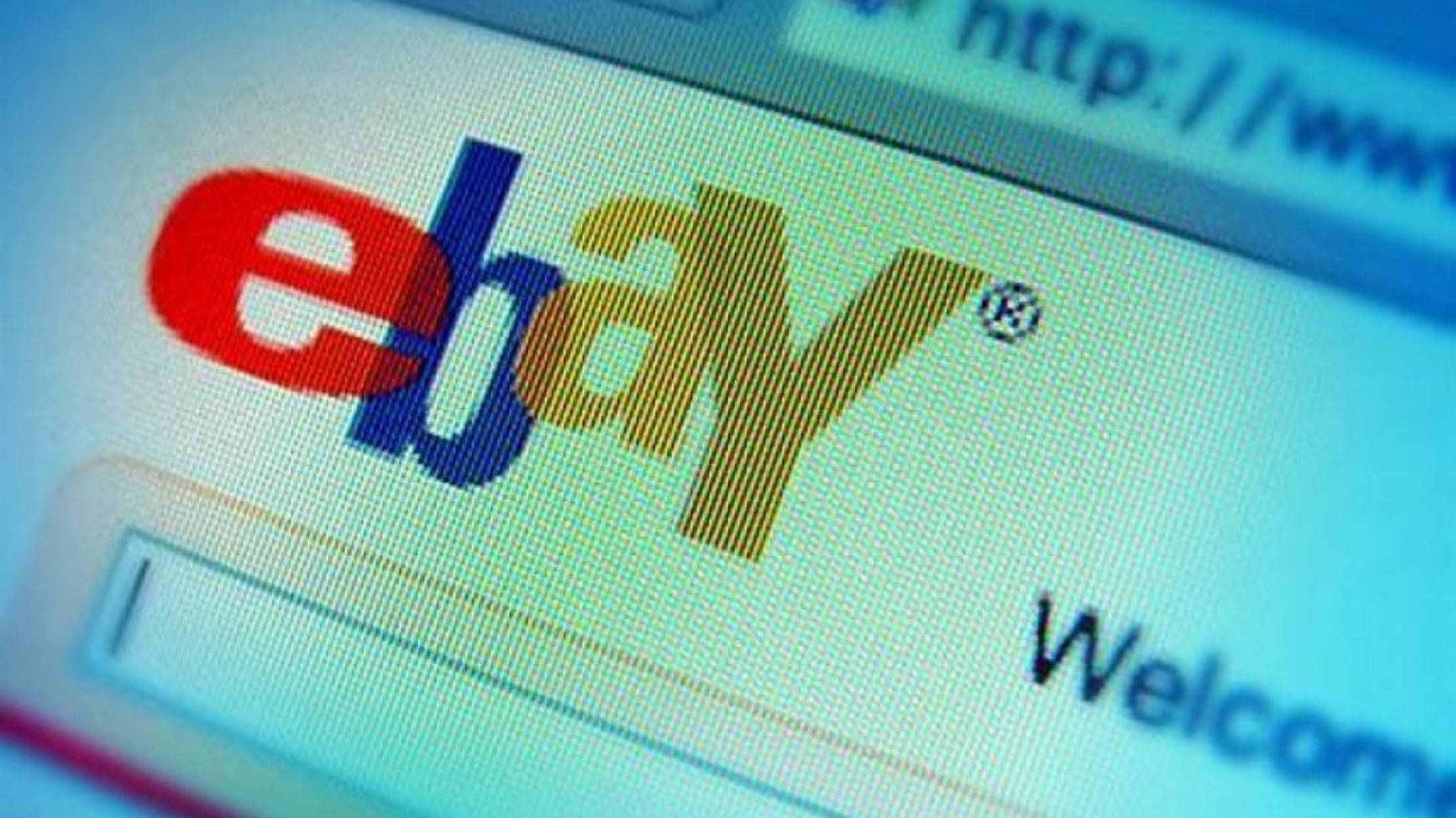 電腦螢幕上的 eBay 壁紙 — 電腦屏幕上顯示的eBay標誌特寫，帶有歡迎訊息和可見的網址列。