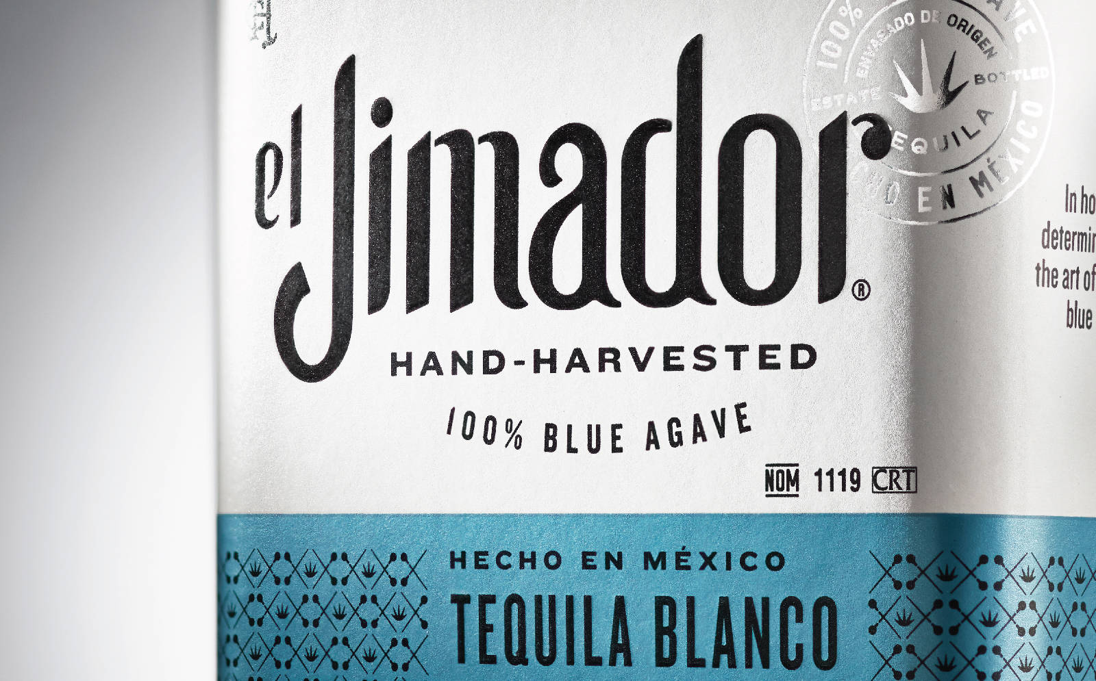 El Jimador 龍舌蘭酒瓶標籤，顯示手工採摘的藍色龍舌蘭和墨西哥產地。