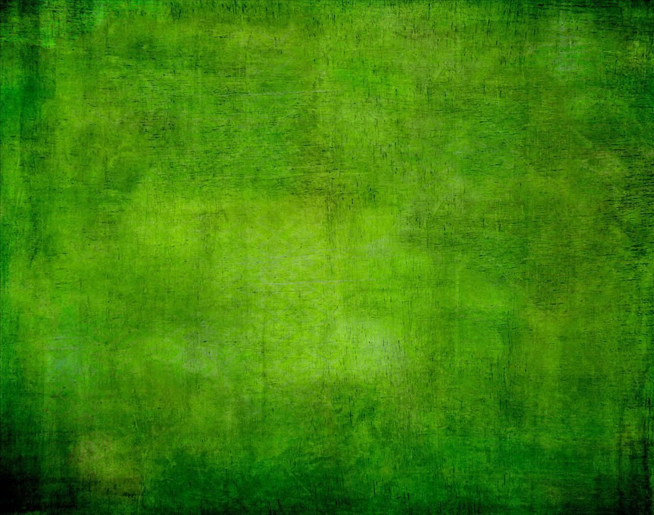 充滿活力的綠色紋理抽象背景，帶有筆觸圖案。