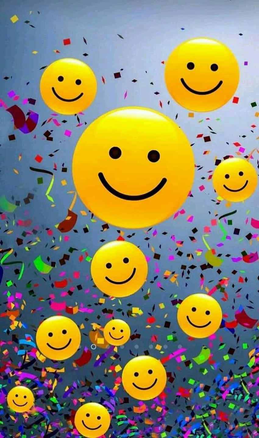 Emoji彩紙個人頭像 壁紙 — 鮮黃色笑臉氣球在柔和藍天背景下漂浮於彩色紙屑之中。