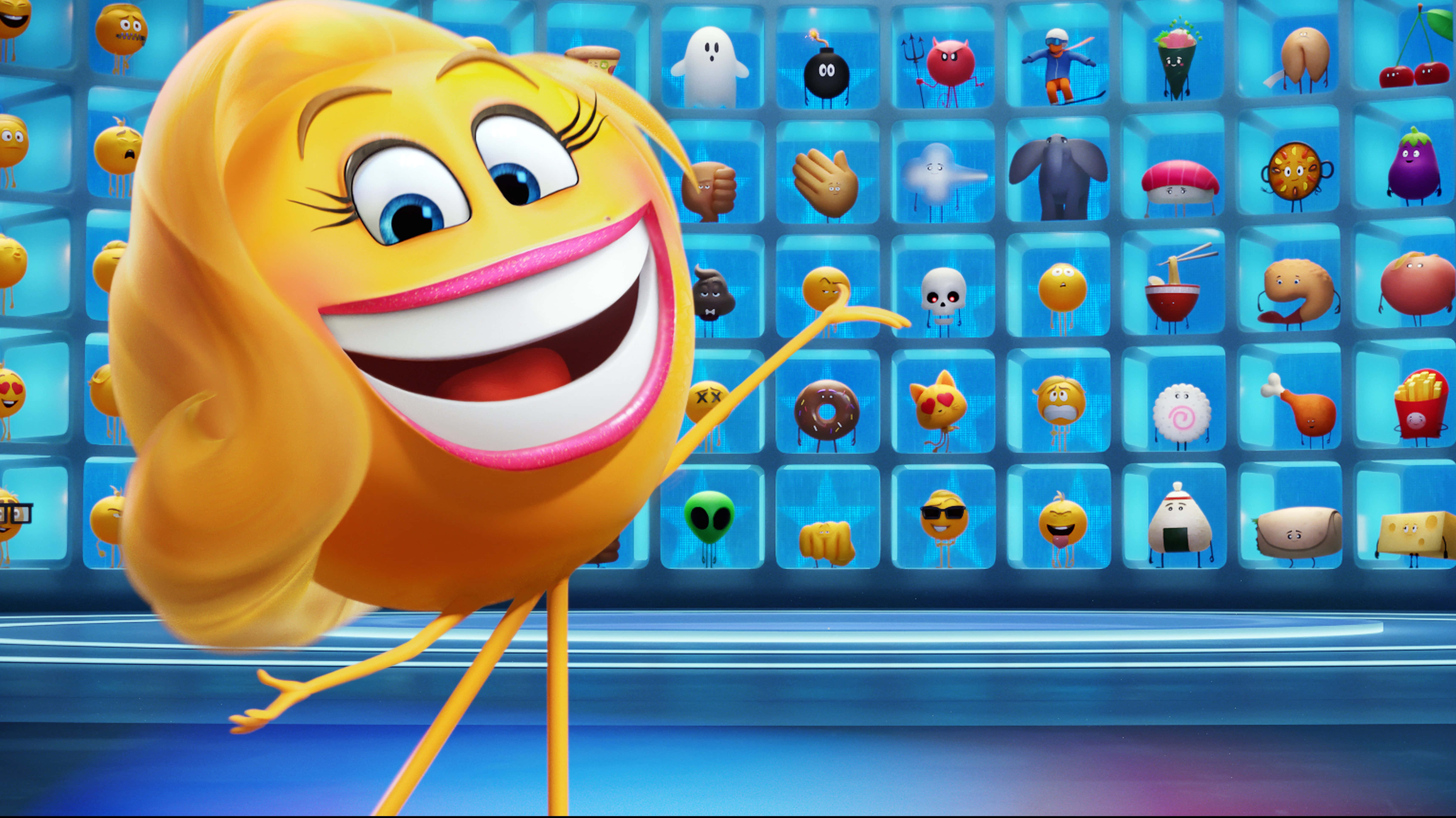 《Emoji電影》Smiler完整照 壁紙 — 一個快樂的黃色表情符號，長髮，笑容燦爛，站在一個發光的網格前，網格上有各種動畫表情符號角色。