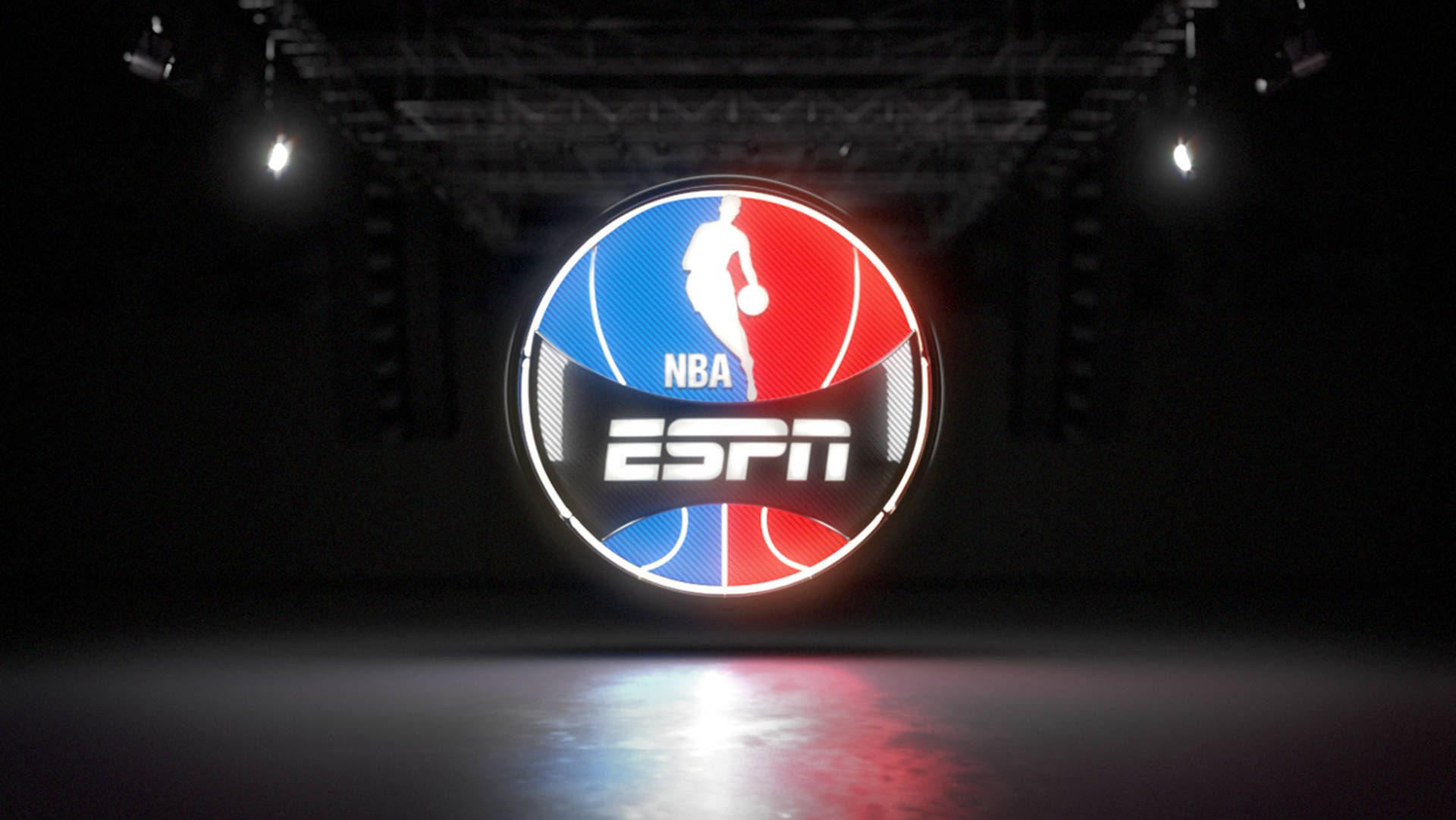 NBA ESPN標誌在黑暗舞台上發光，配有聚光燈和反光地板。