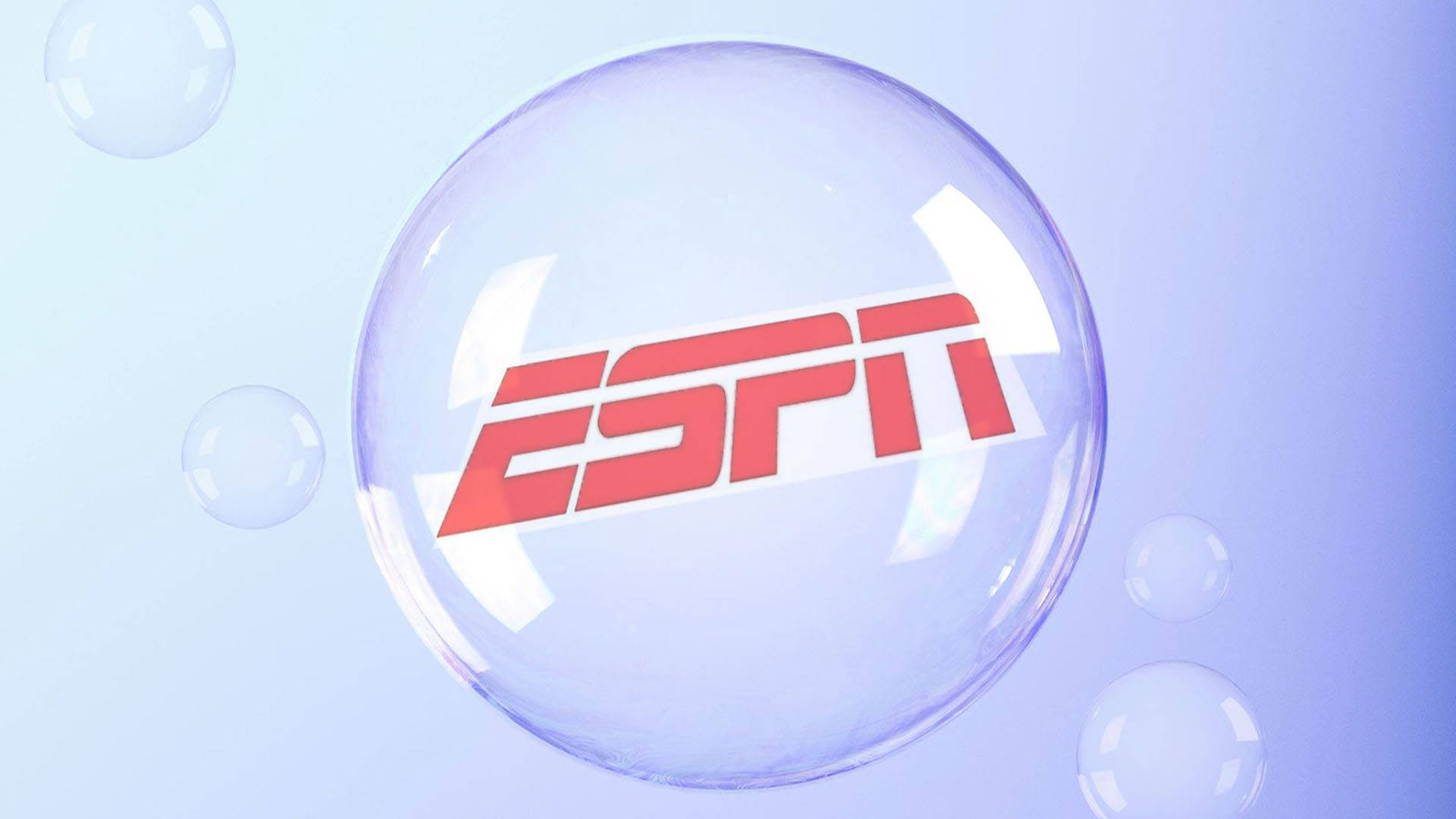 ESPN標誌於氣泡中 壁紙 — 一個帶有ESPN標誌的大型透明氣泡漂浮在柔和的藍色漸變背景上，周圍有較小的氣泡。