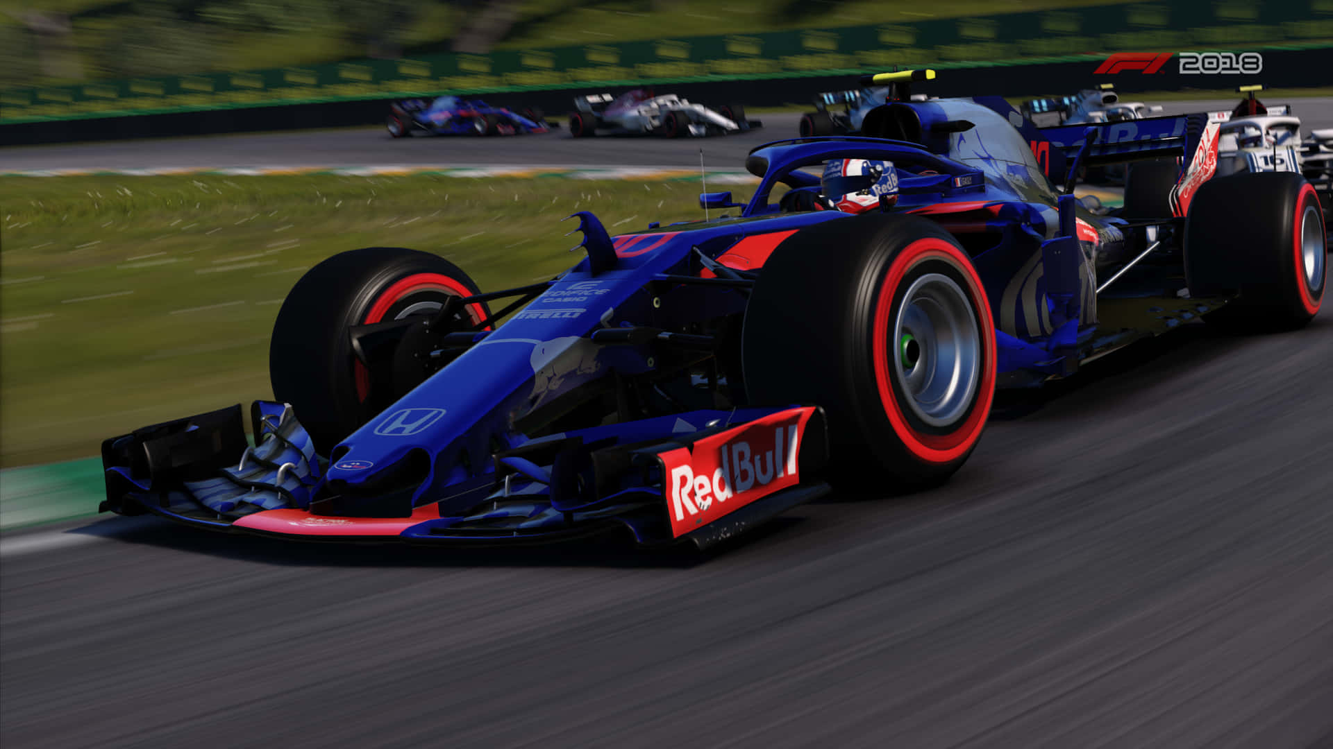 藍紅色的Red Bull Formula 1賽車在賽道上疾馳，帶有動態模糊效果。