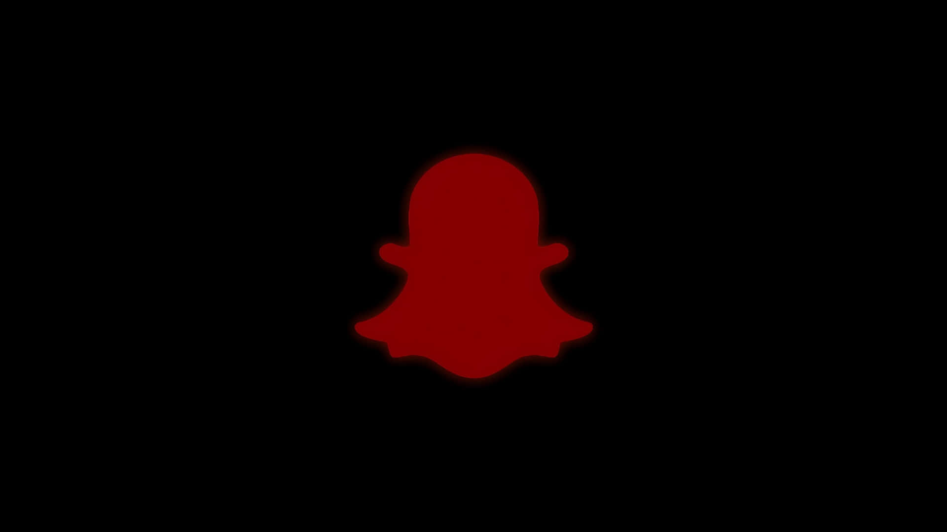  壁紙 — 一個發光的紅色Snapchat鬼魂標誌，居中在純黑色背景上。
