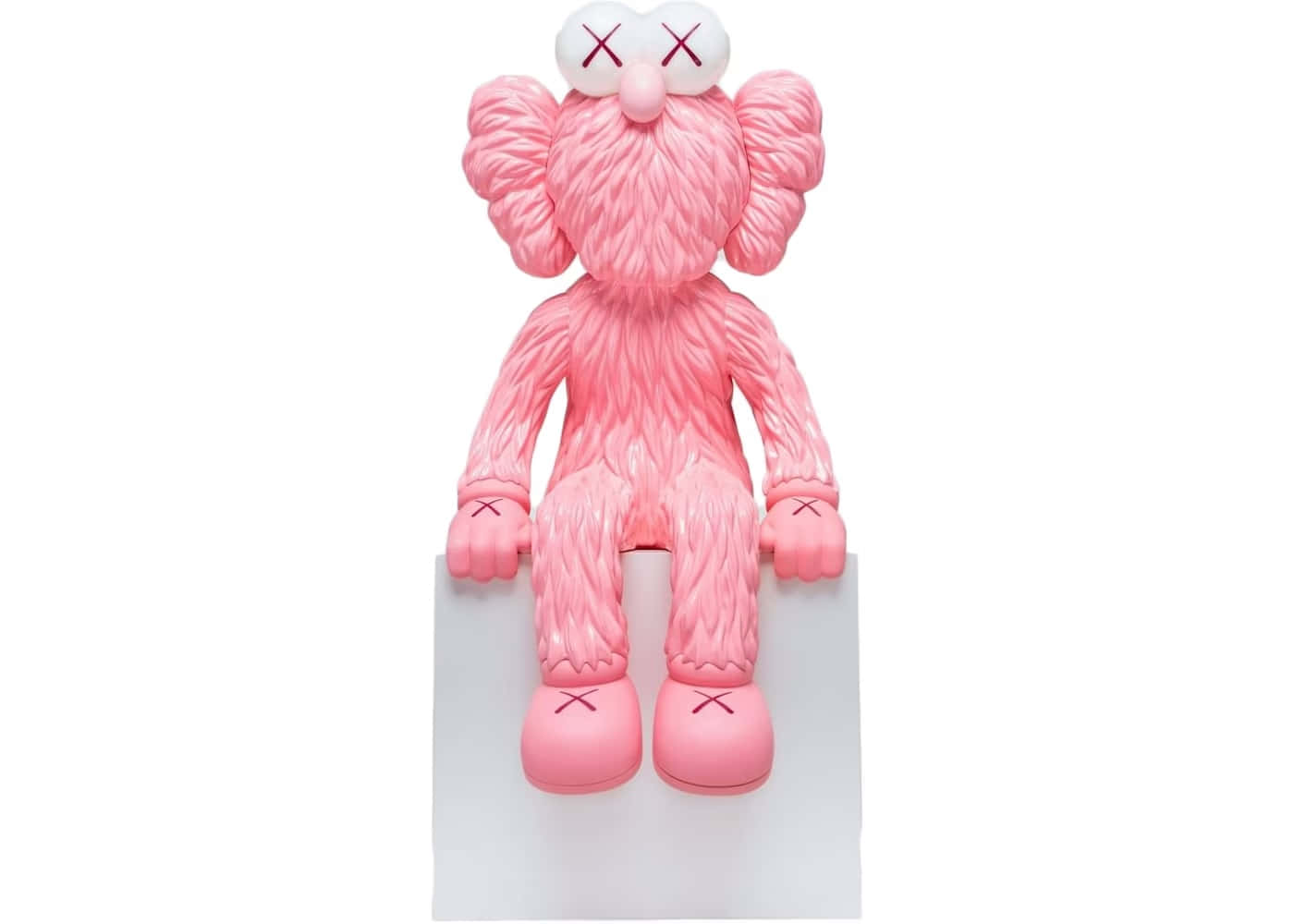  壁紙 — 一個粉紅色嘅KAWS Companion公仔，有X形眼睛，靜靜噉坐喺白色底座上，背景係純白色。