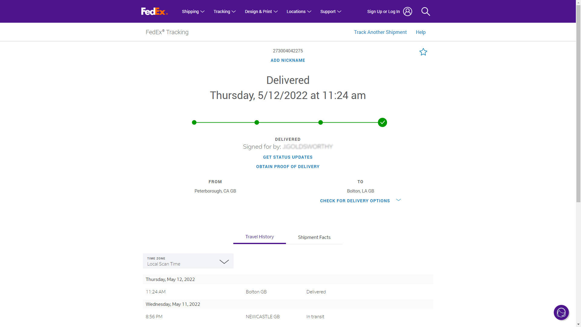 FedEx 送達確認畫面顯示包裹已於 2022 年 5 月 12 日送達。