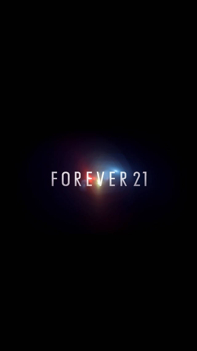 Forever 21 黑色美學 壁紙 — Forever 21 標誌在黑色背景上發出紅色和藍色的光芒。