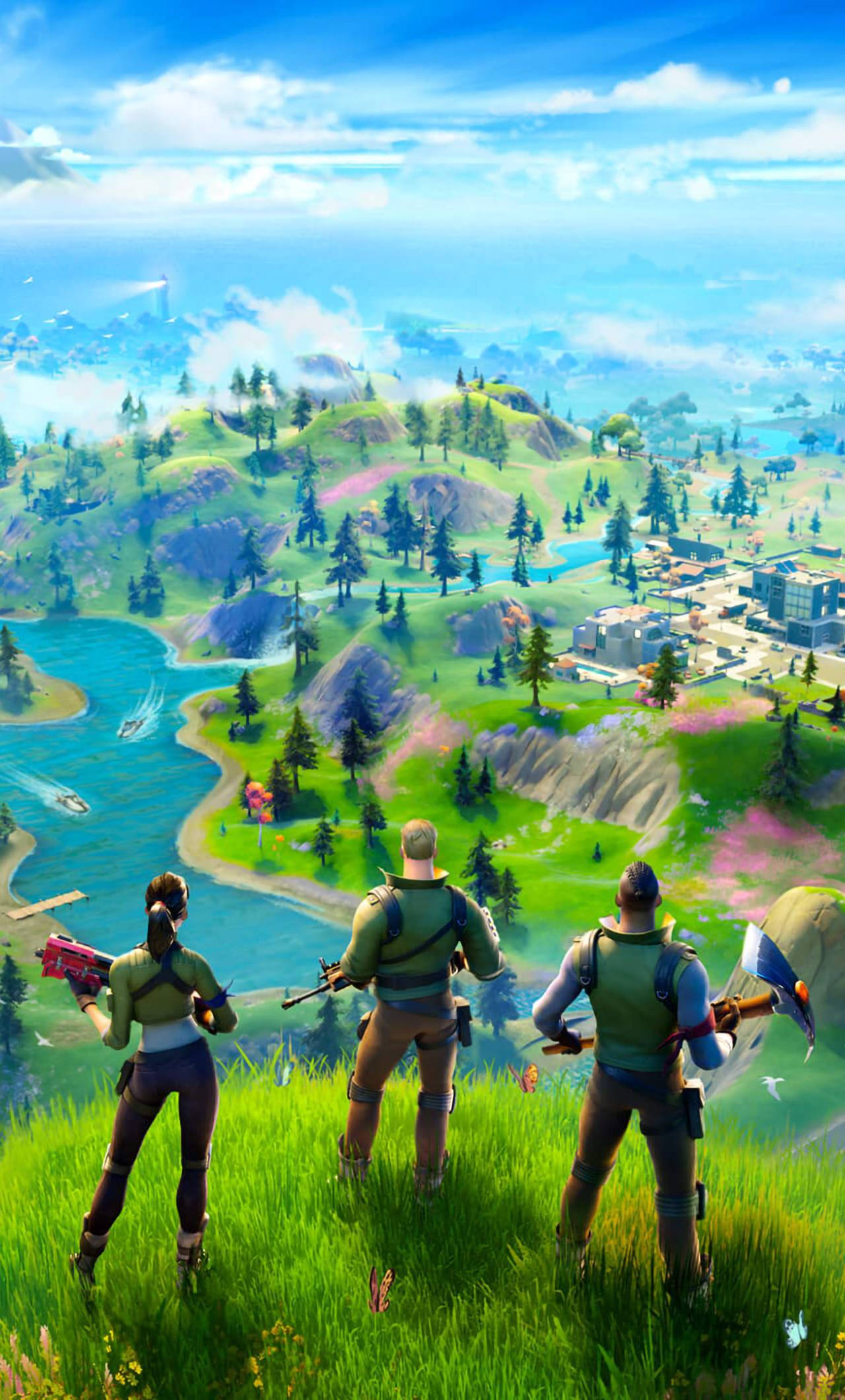 《Fortnite 第二章：第六季》山頂視野 壁紙 — 三個Fortnite角色站在長滿草的懸崖上，俯瞰著充滿活力的景觀，有河流、森林和遠處的建築物，在明亮的藍天下。