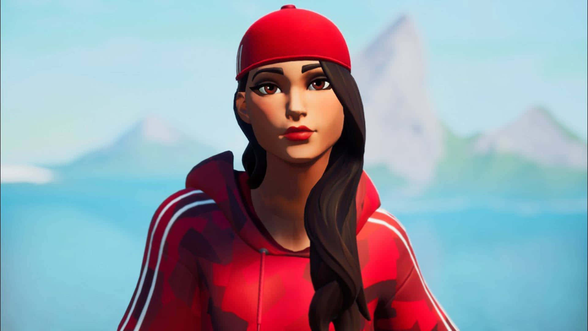 透過《Fortnite》戰鬥季票解鎖Ruby造型 壁紙 — 一個風格化的女性角色，穿著紅色連帽衫和帽子，站在柔和的藍色山脈背景下。