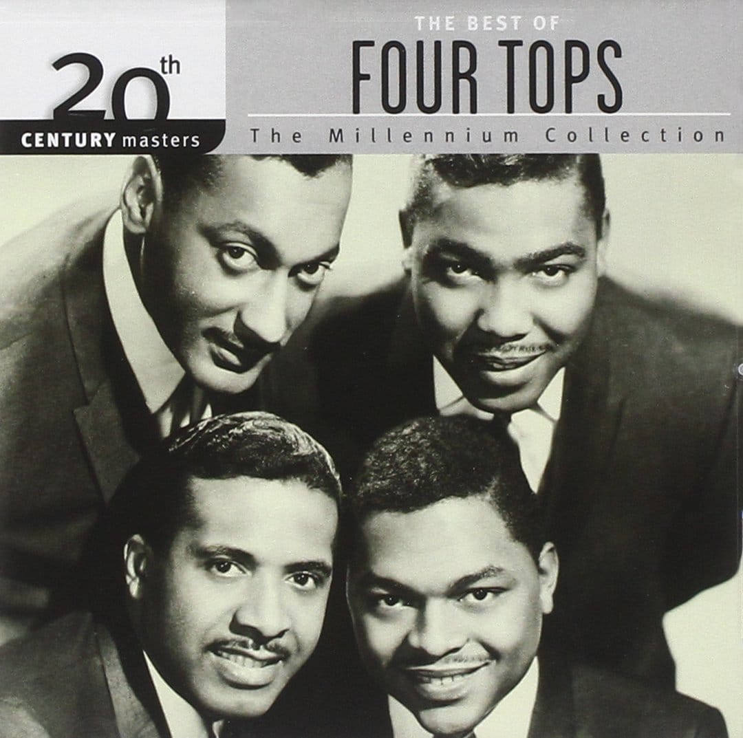 Four Tops 樂隊成員穿著西裝在專輯封面上微笑。