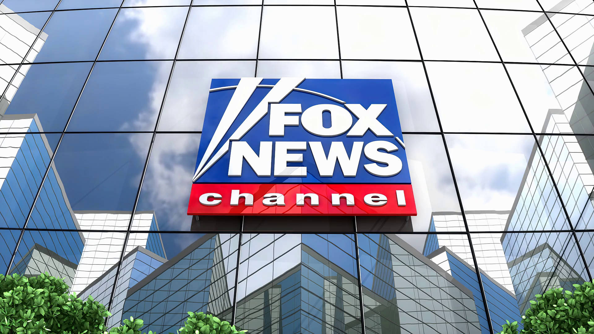 Fox News Channel 壁面標誌 壁紙 — Fox News Channel 標誌安裝在玻璃摩天大樓外牆上，反射藍天和白雲。