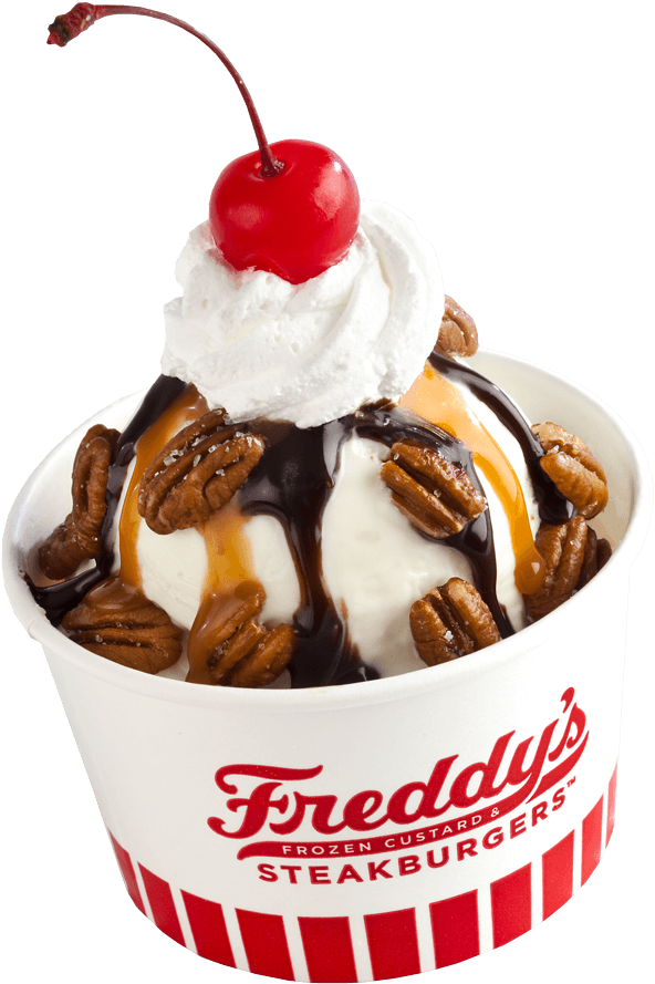 Freddy's 冷凍奶凍甜點 壁紙 — Freddy's 的冷凍奶凍聖代，上面有鮮奶油、焦糖醬、巧克力糖漿和山核桃，並以鮮紅櫻桃點綴。