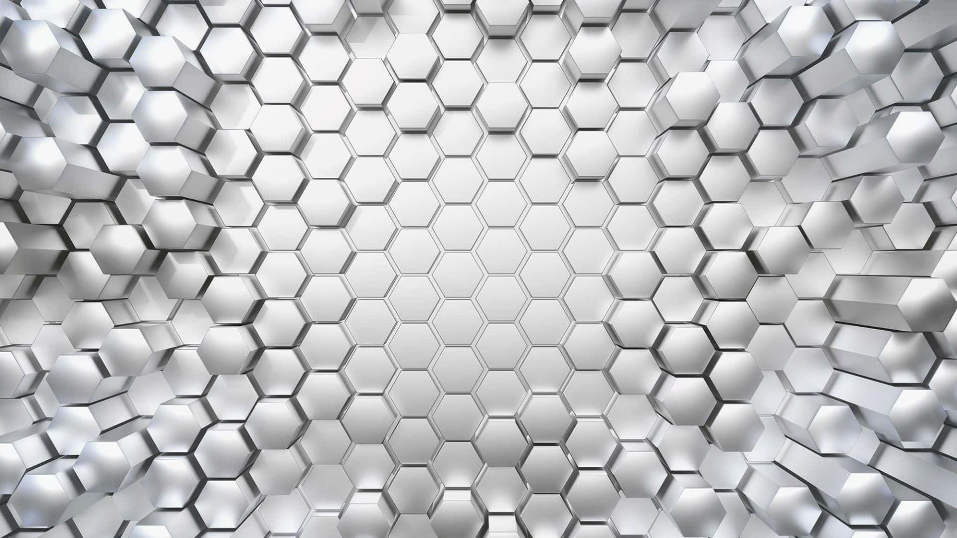  壁紙 — 一面未來風格的銀色六角形瓷磚牆，具有幾何深度和金屬光澤。