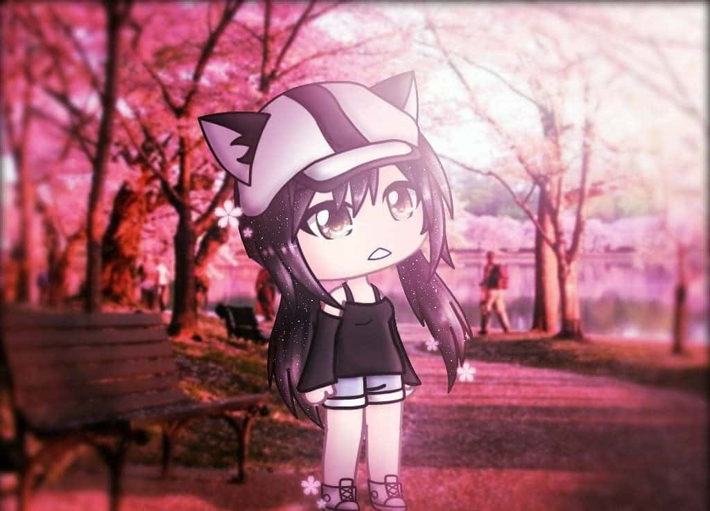 Q版動漫女孩戴著貓耳，在公園的粉紅色櫻花下。