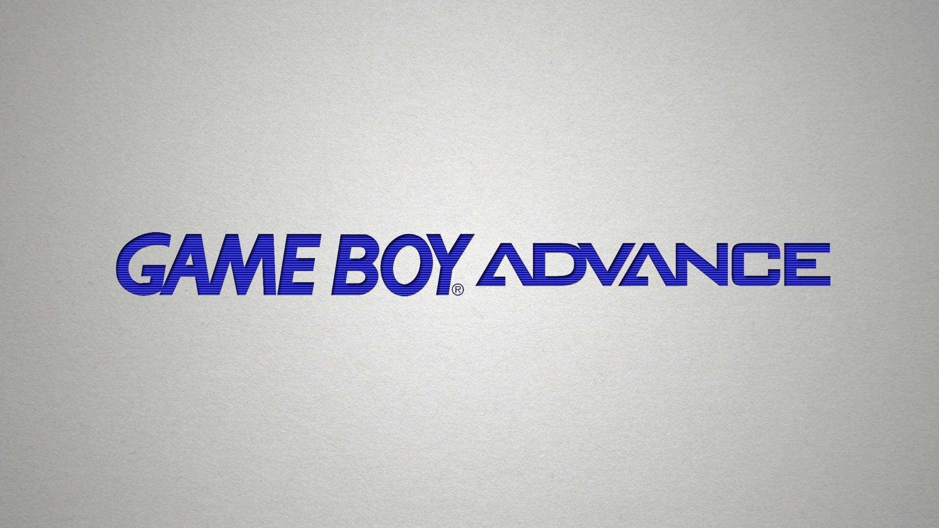 Game Boy Advance 標誌 壁紙 — 大膽的藍色 Game Boy Advance 標誌居中於有紋理的淺灰色背景上。