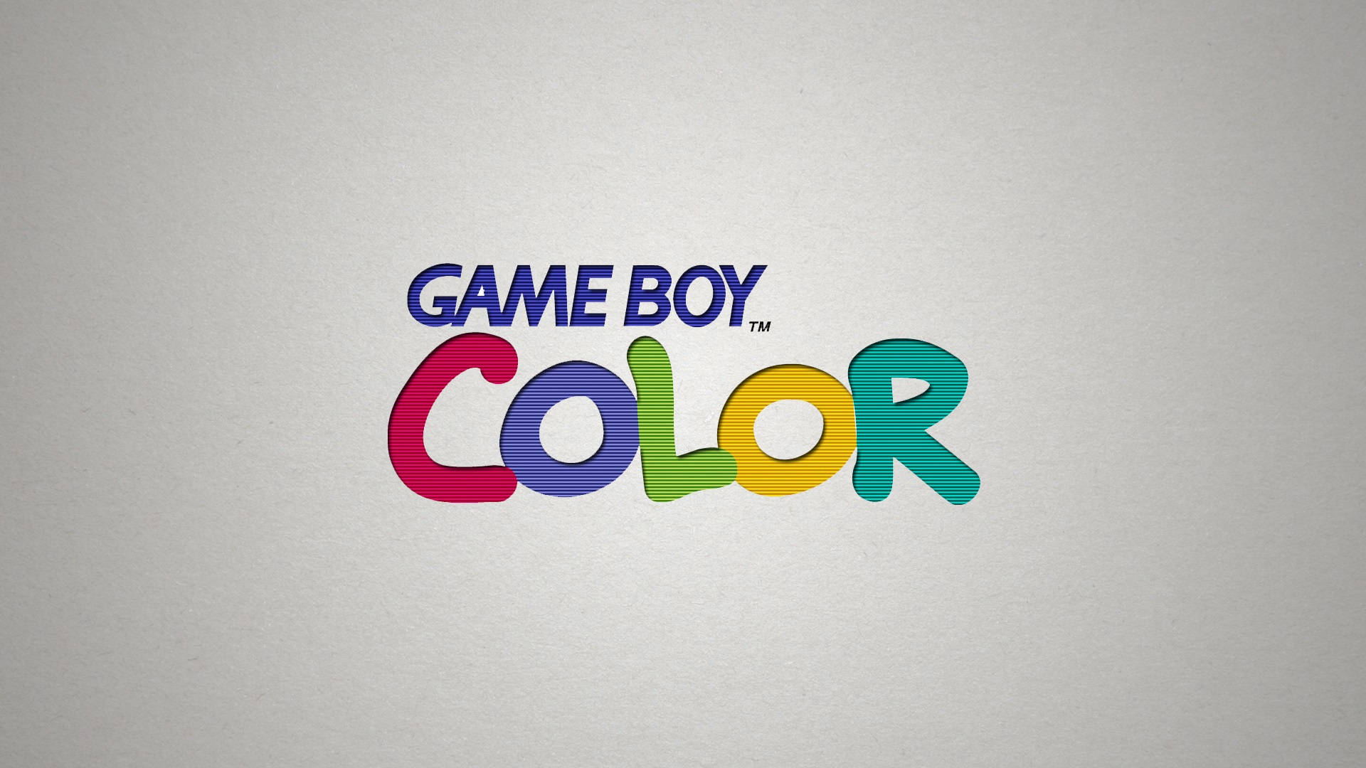 Game Boy Color 標誌 壁紙 — 色彩繽紛的Game Boy Color標誌在樸素的紋理灰色背景上脫穎而出。