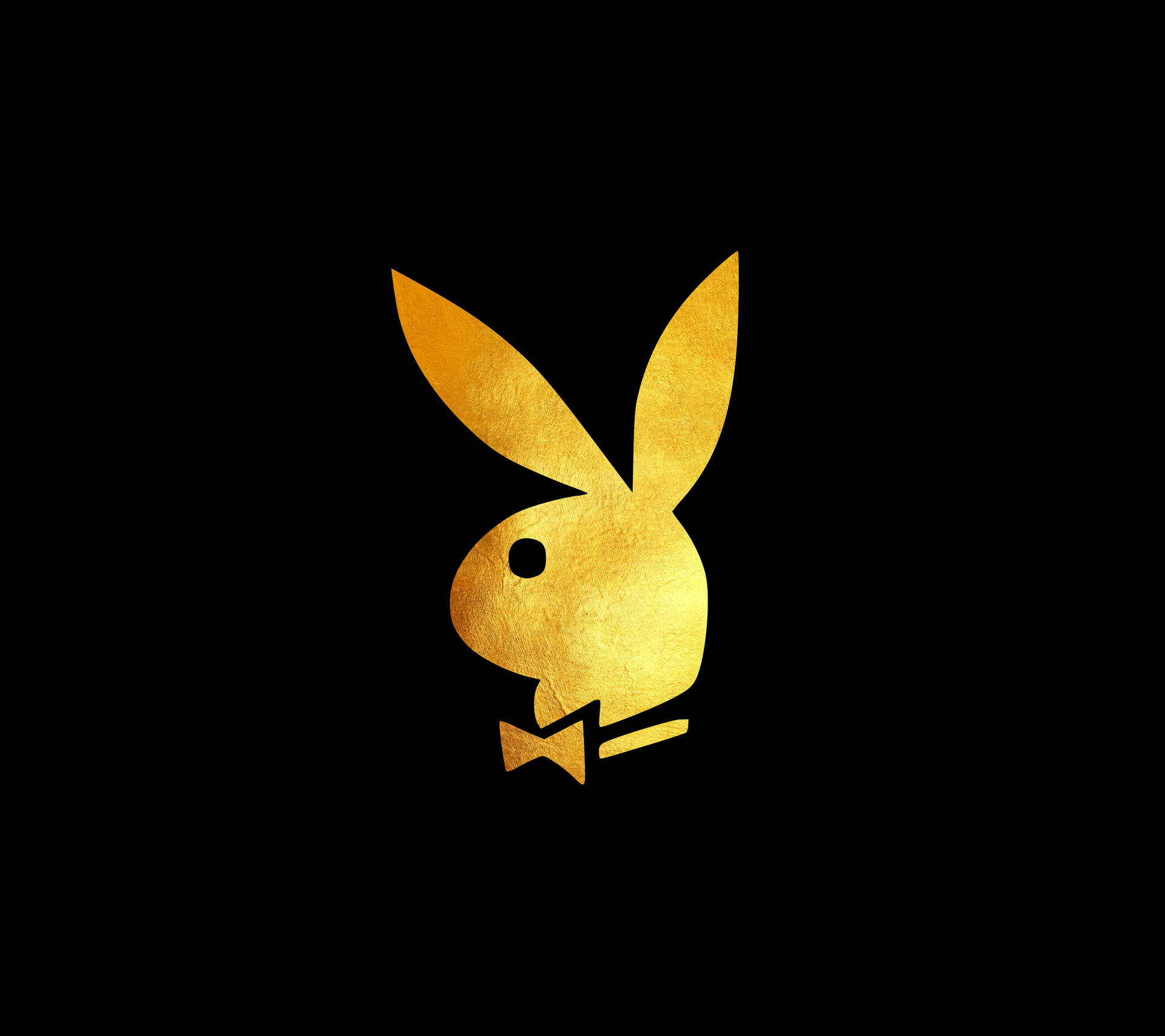 黑色背景上的金色Playboy兔子標誌
