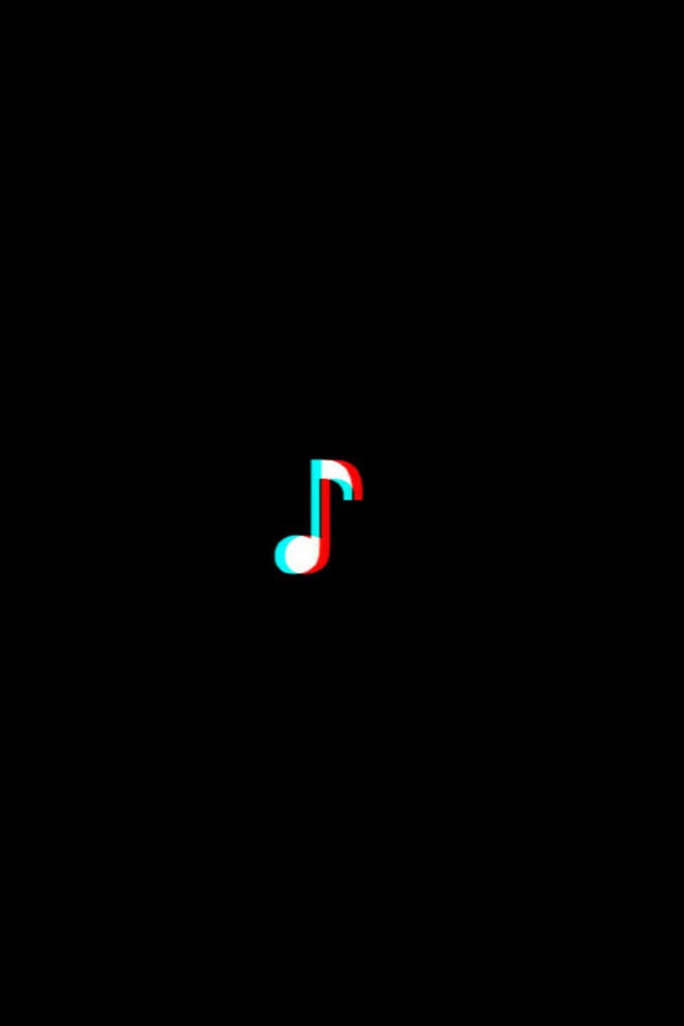 黑 glitch 音符 壁紙 — 一個單一的3D立體紅藍音符在純黑背景上發出紅色和青色的光芒。