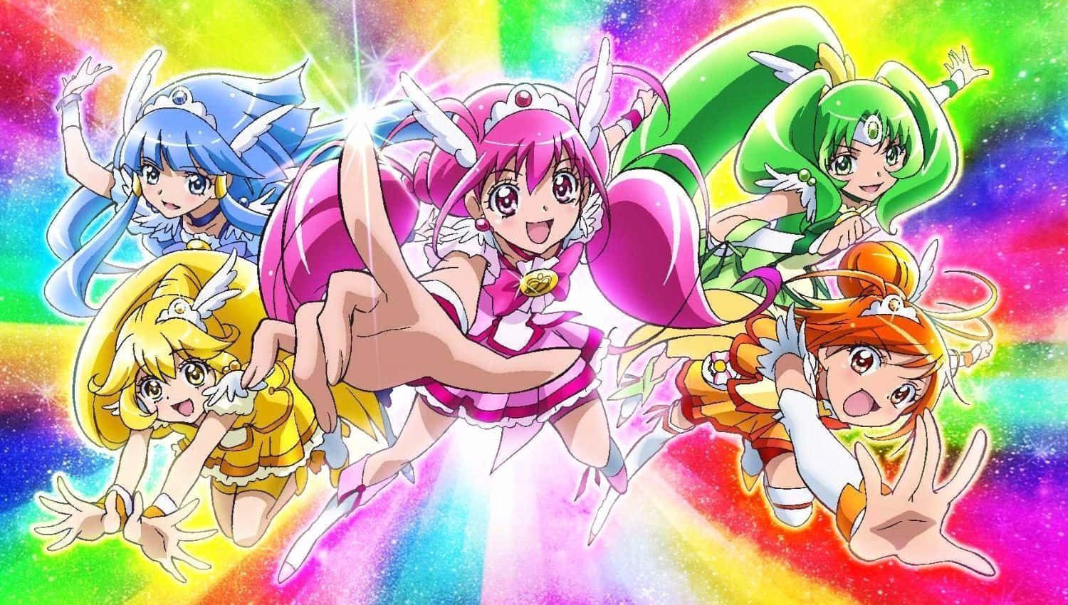 五個穿著魔法服裝的動畫女孩在身後帶著彩虹閃光擺姿勢。