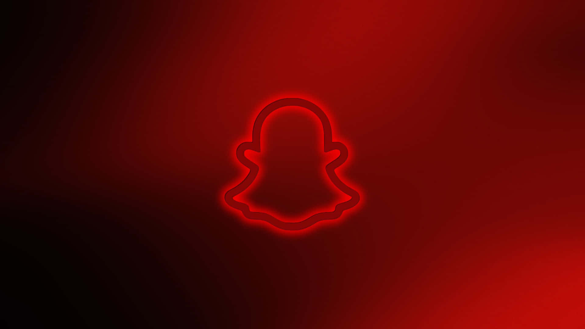  壁紙 — 一個發光紅色霓虹燈Snapchat鬼魂標誌，居中在漸變紅色背景上。