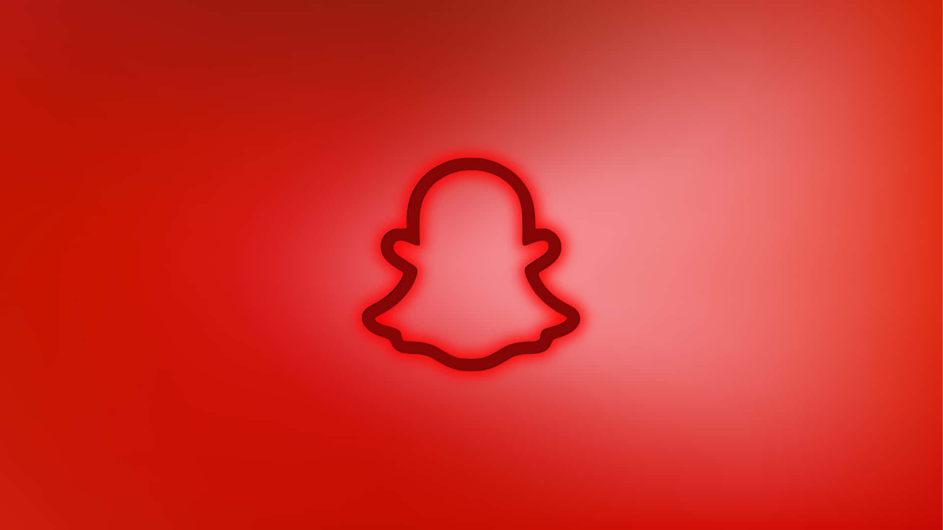  壁紙 — Snapchat 鬼魂標誌的發光紅色霓虹輪廓，居中在漸變紅色背景上。