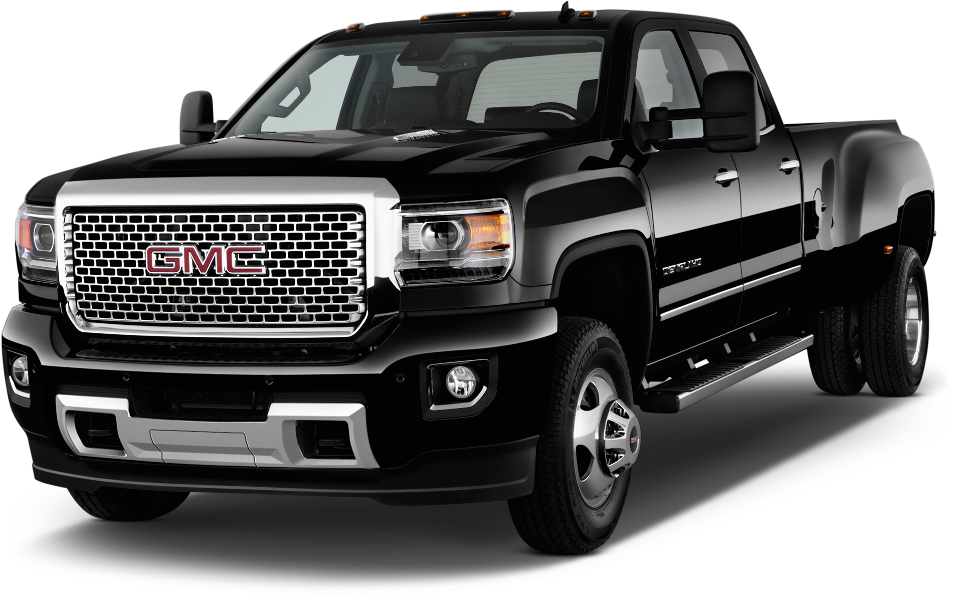 黑色GMC Sierra Denali皮卡 壁紙 — 一輛時尚的黑色GMC Sierra皮卡車，帶有鍍鉻裝飾和醒目格柵，孤立地矗立在純黑色背景前。
